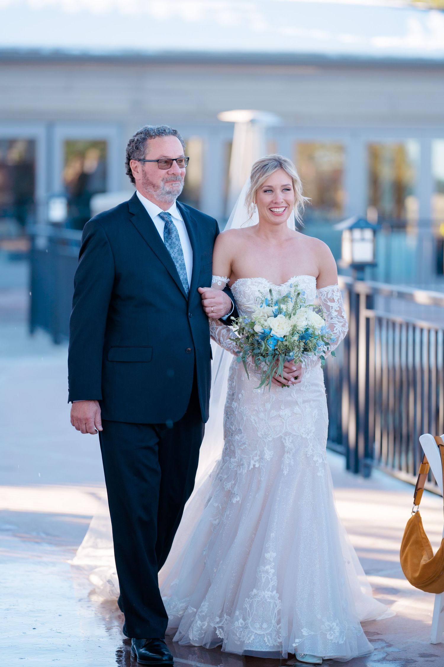 bride and dad walking down aisle