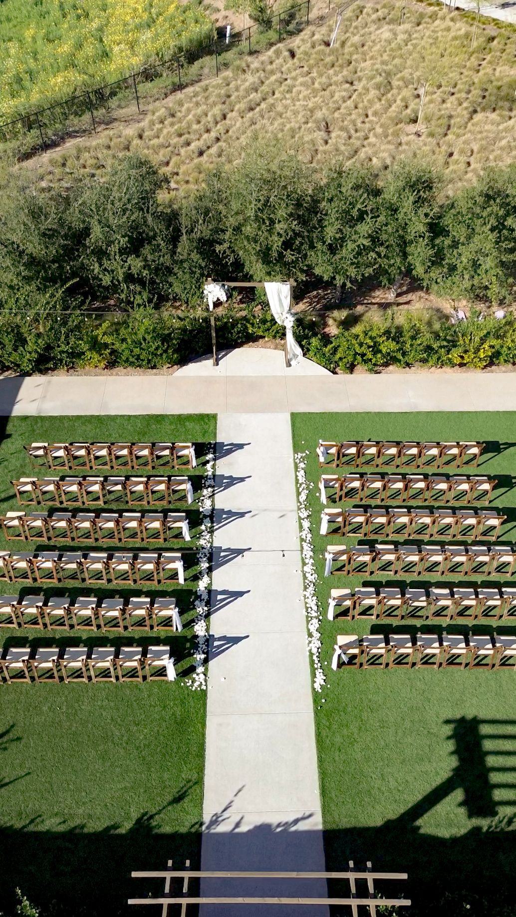 Aerial view of the outdoor ceremony space at Canopy Grove by Wedgewood Weddings in Escondido, California, photographed by Sierra Sturt Photo