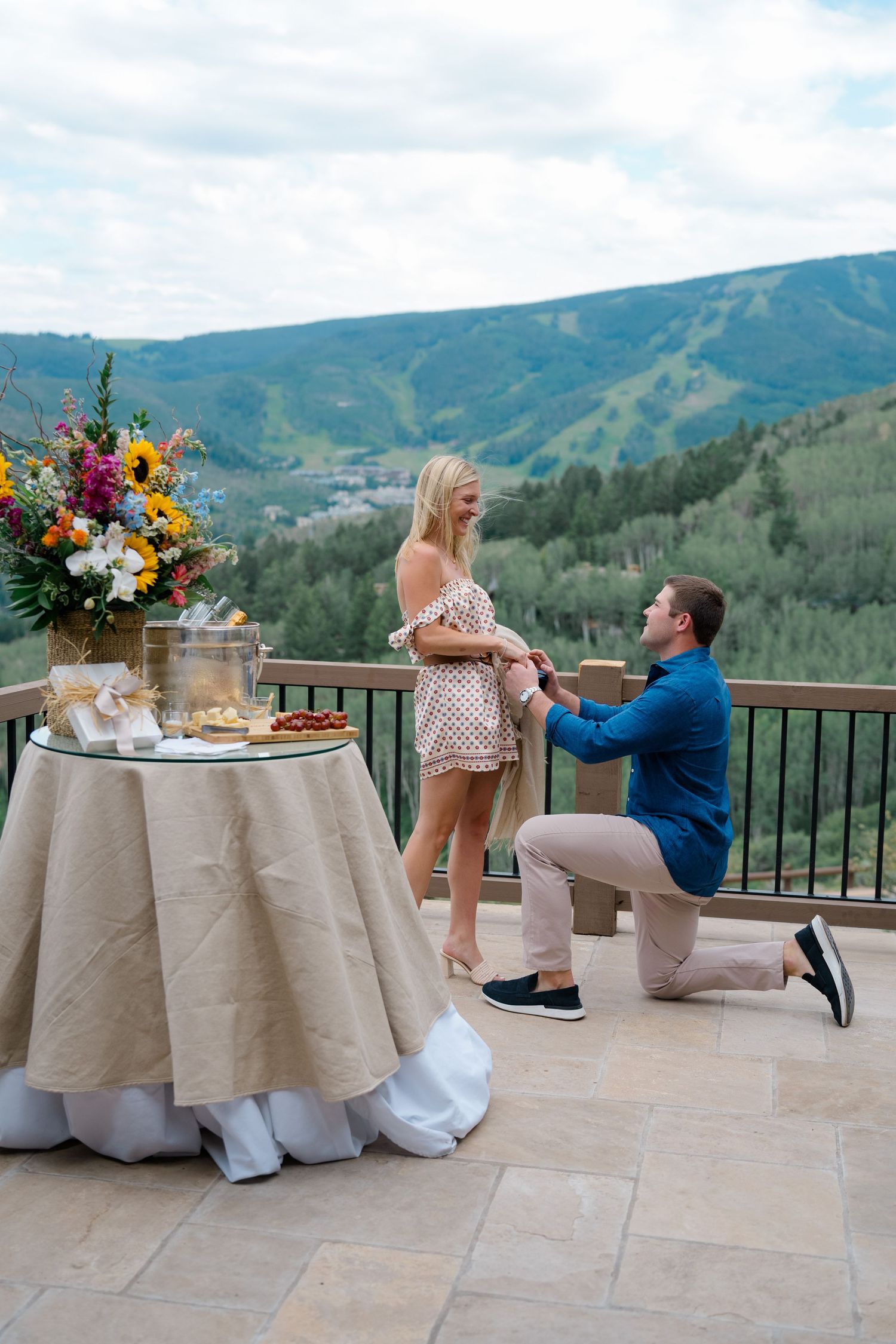 girl very surprised buy guy asking her to marry him