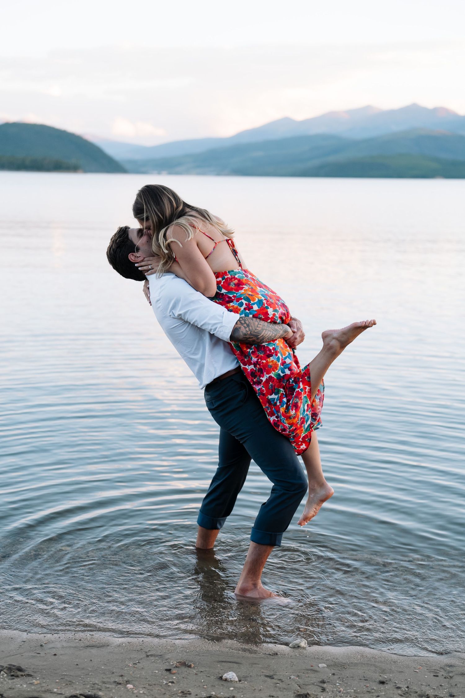 guy and girl getting engaged
