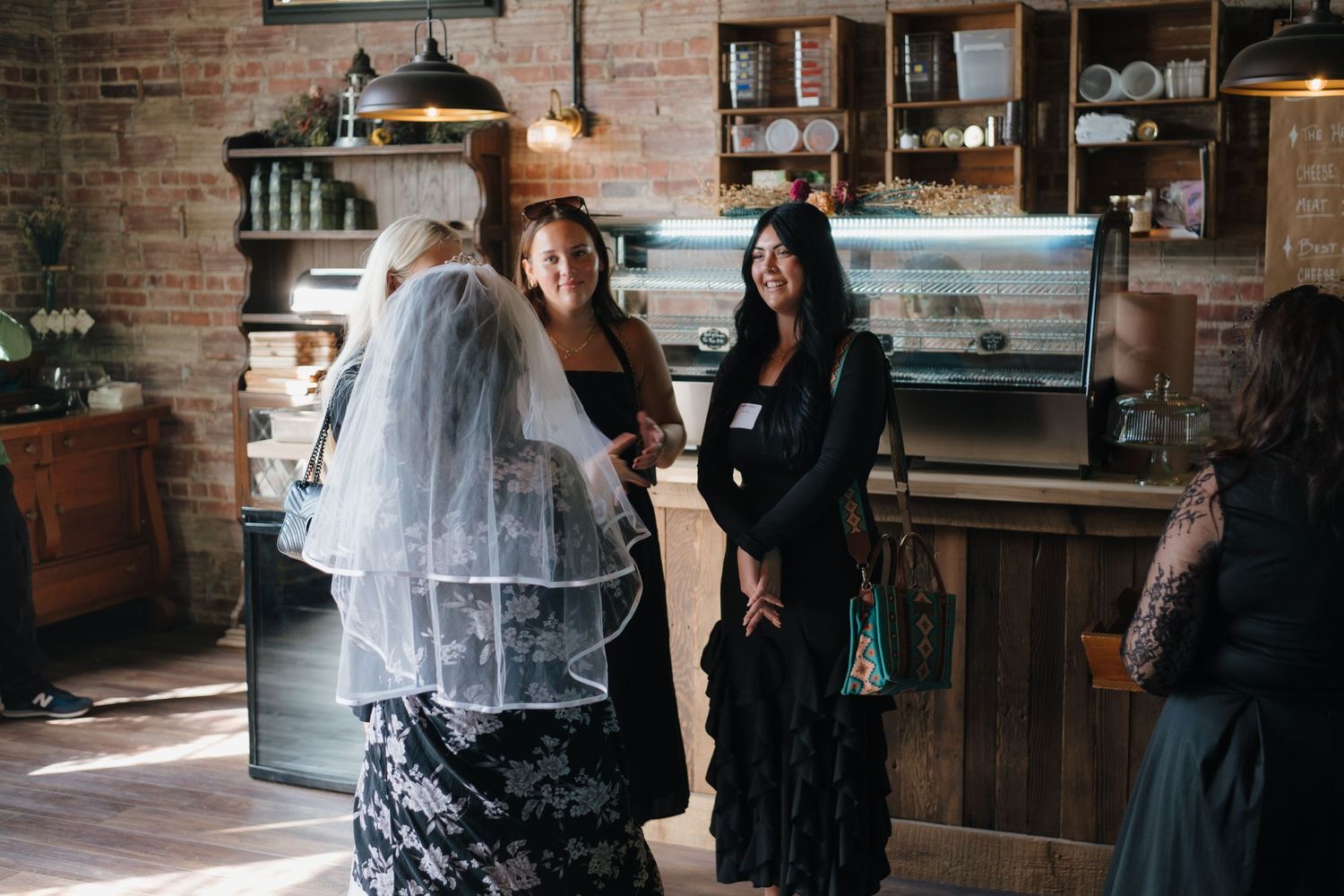 guests attending the KC Wedding guilt murder mystery luncheon at sugar hollow crossing