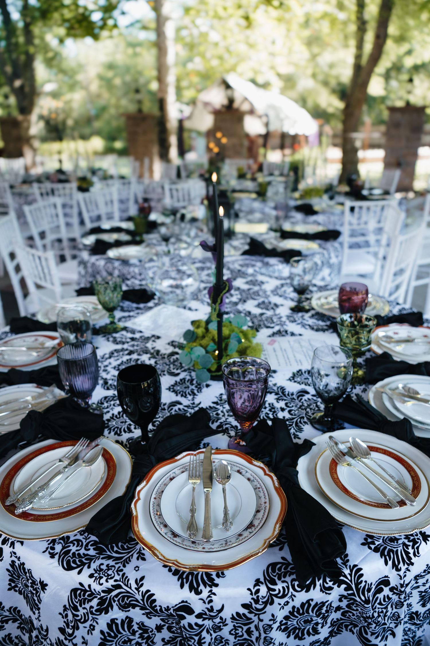 Table setup showing bull in a china shop's china plates