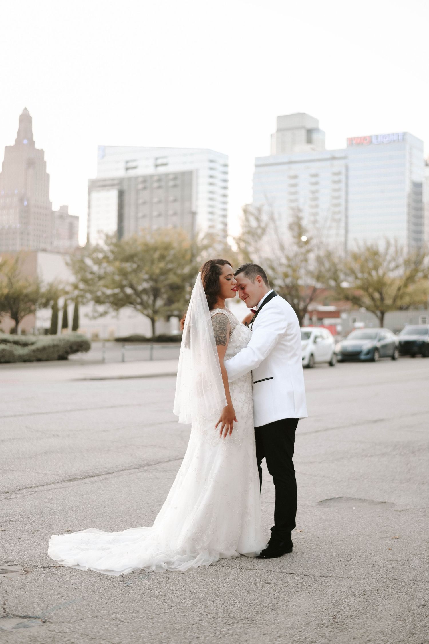 bride and groom standing in downtown Kansas City