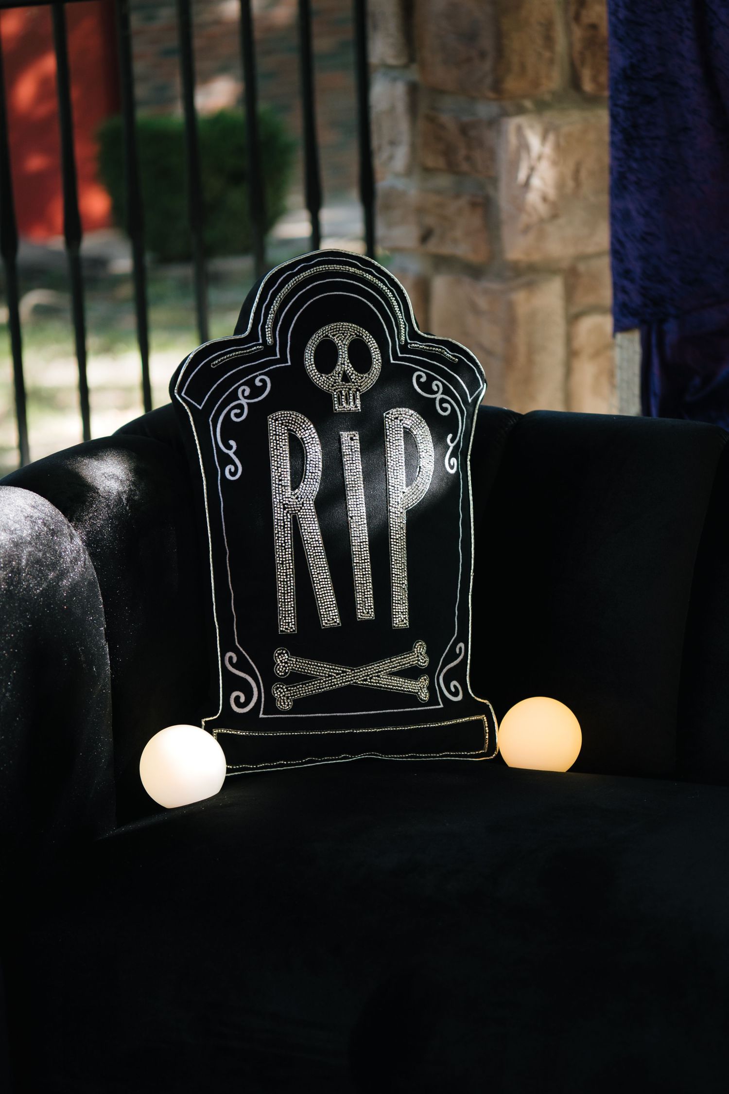RIP pillow at the spooky murder mystery luncheon with kc wedding guild and Kansas City engaged