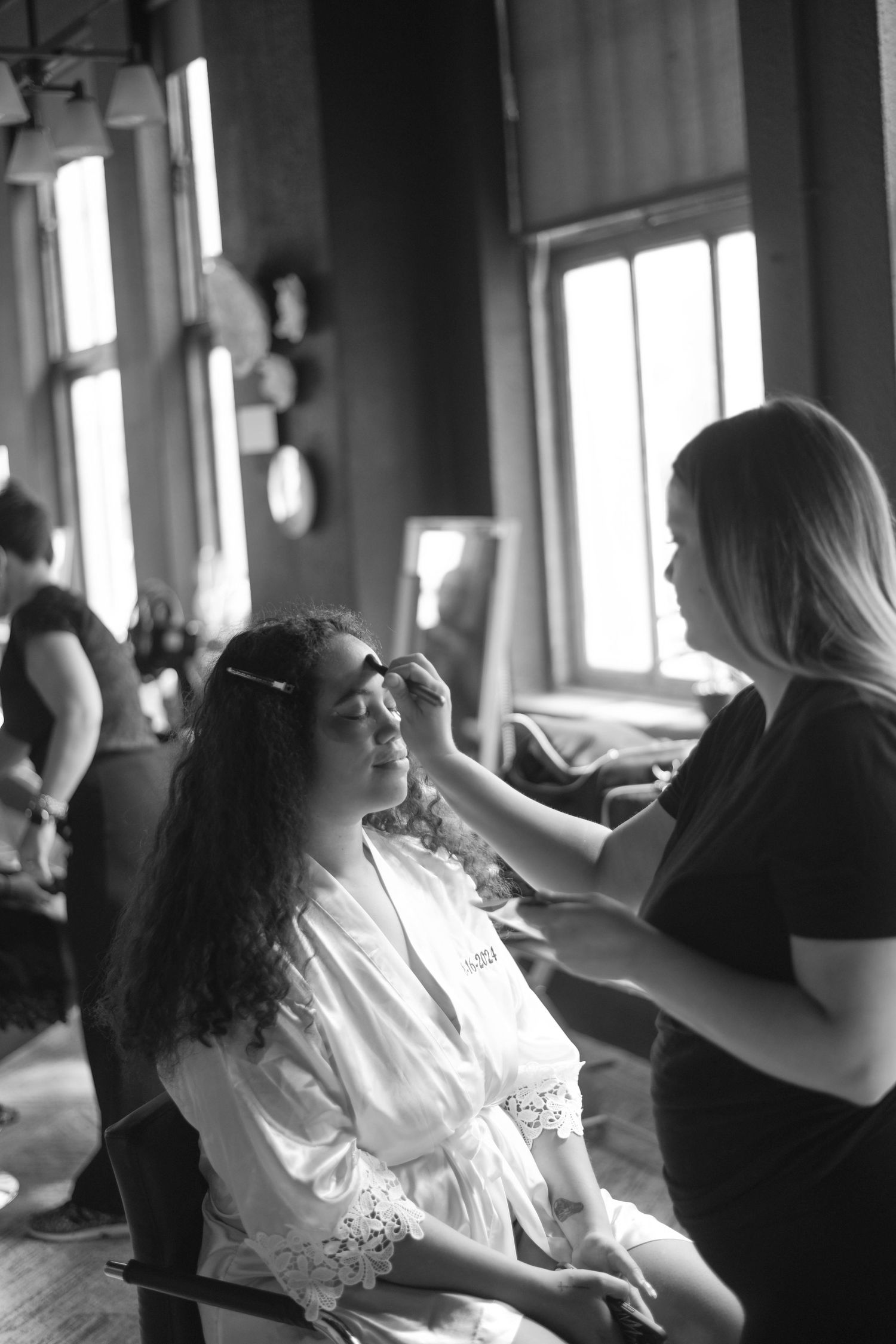 makeup artist doing bridal makeup in Kansas City
