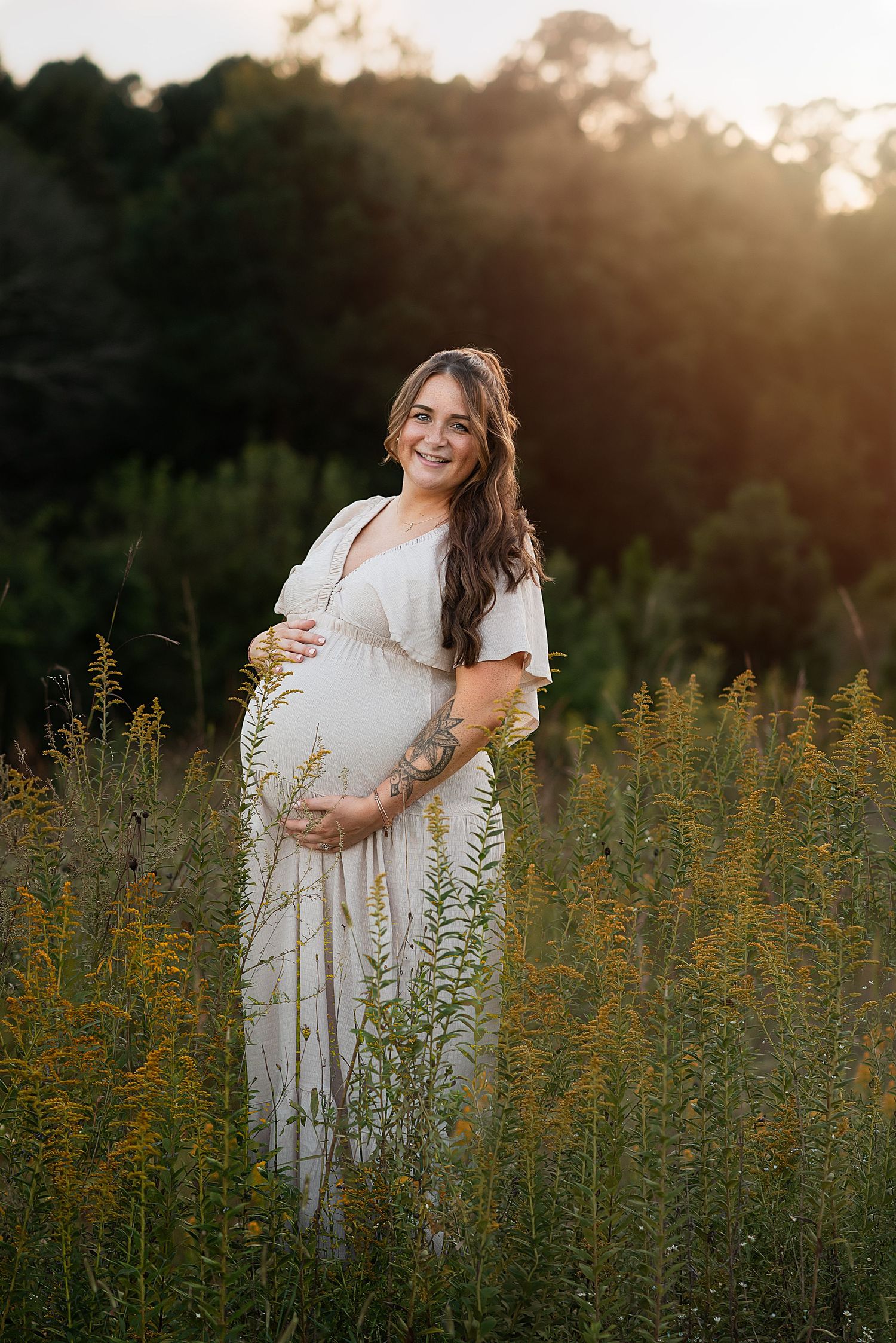 Maternity photo session during golden hour in Raleigh, NC. Fine art portrait photograph.