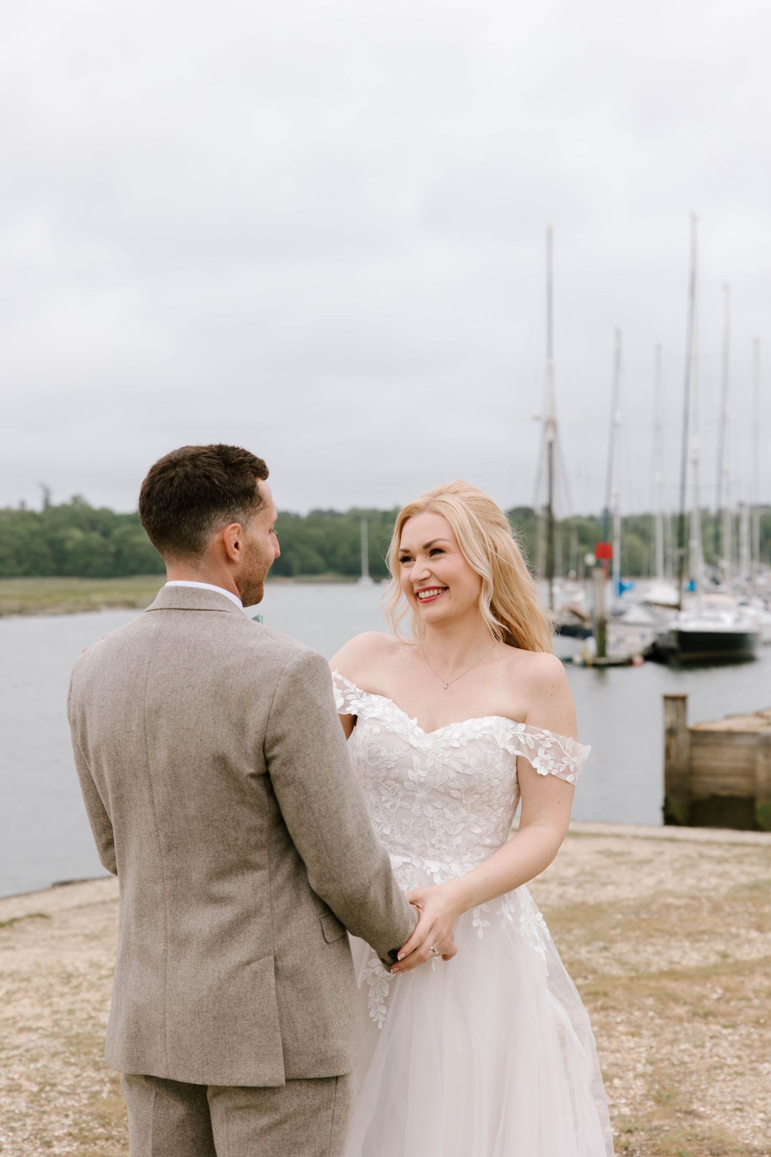 Wedding day for a bride and groom, they are having their couple portraits done in New Dorset, Dorset, Hampshire.