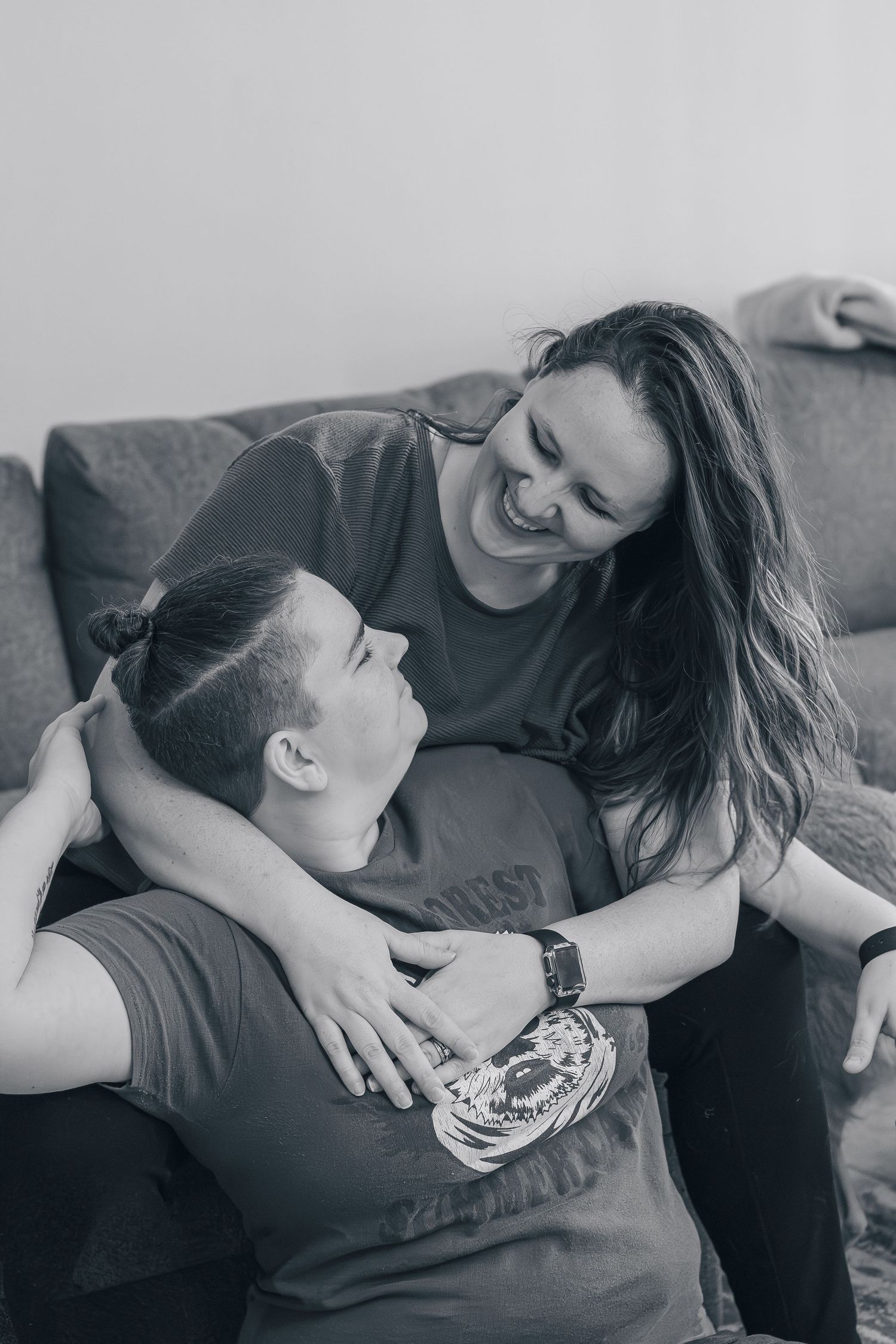 A couple shares tender moments together in a series of black and white romantic photos.