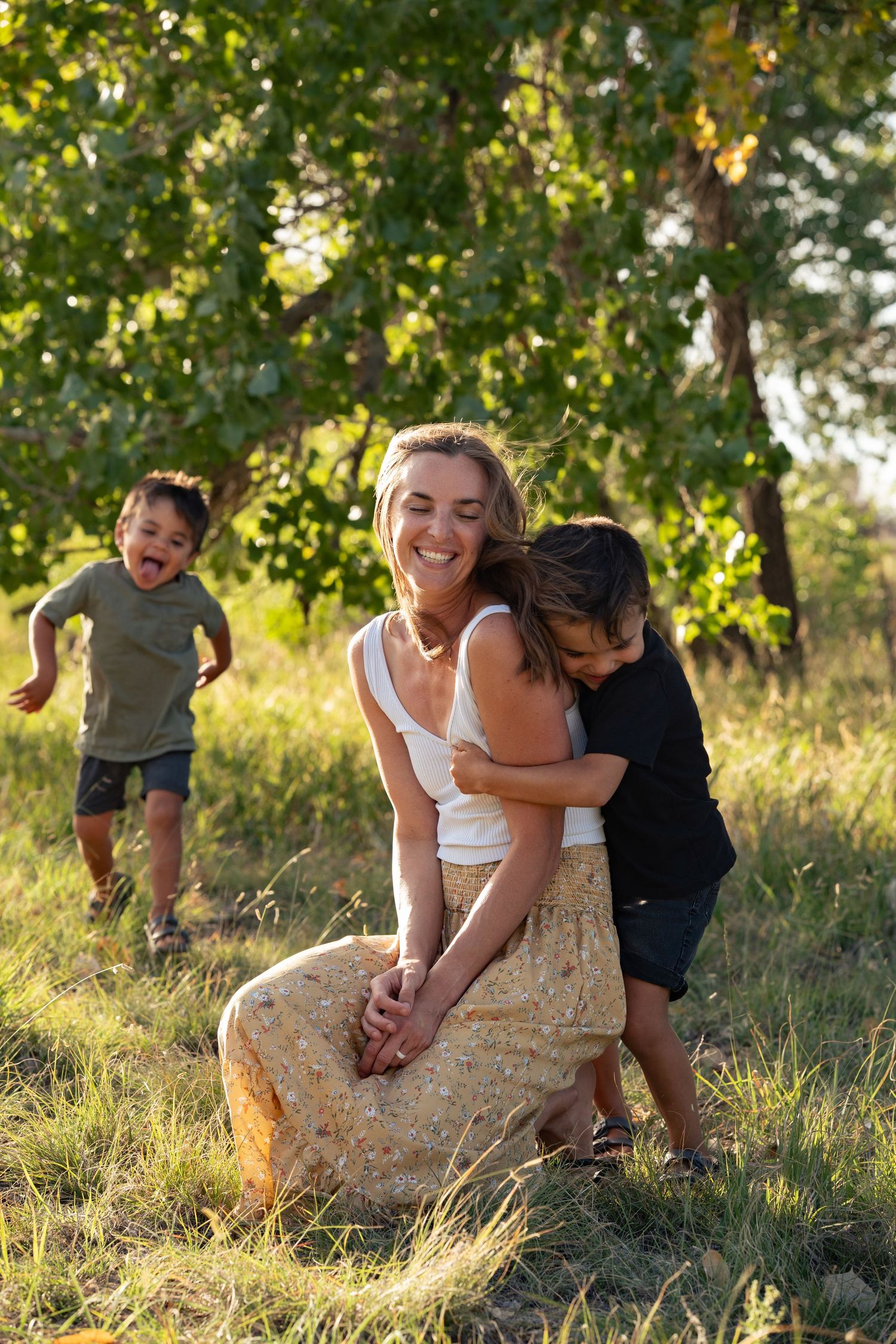 Mom getting surprised by her boys.