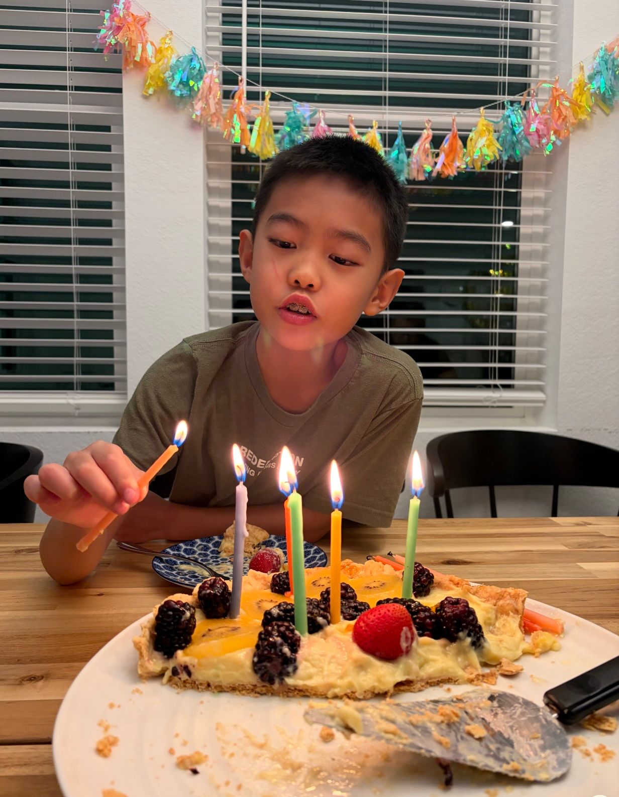 Birthday tart and kid.