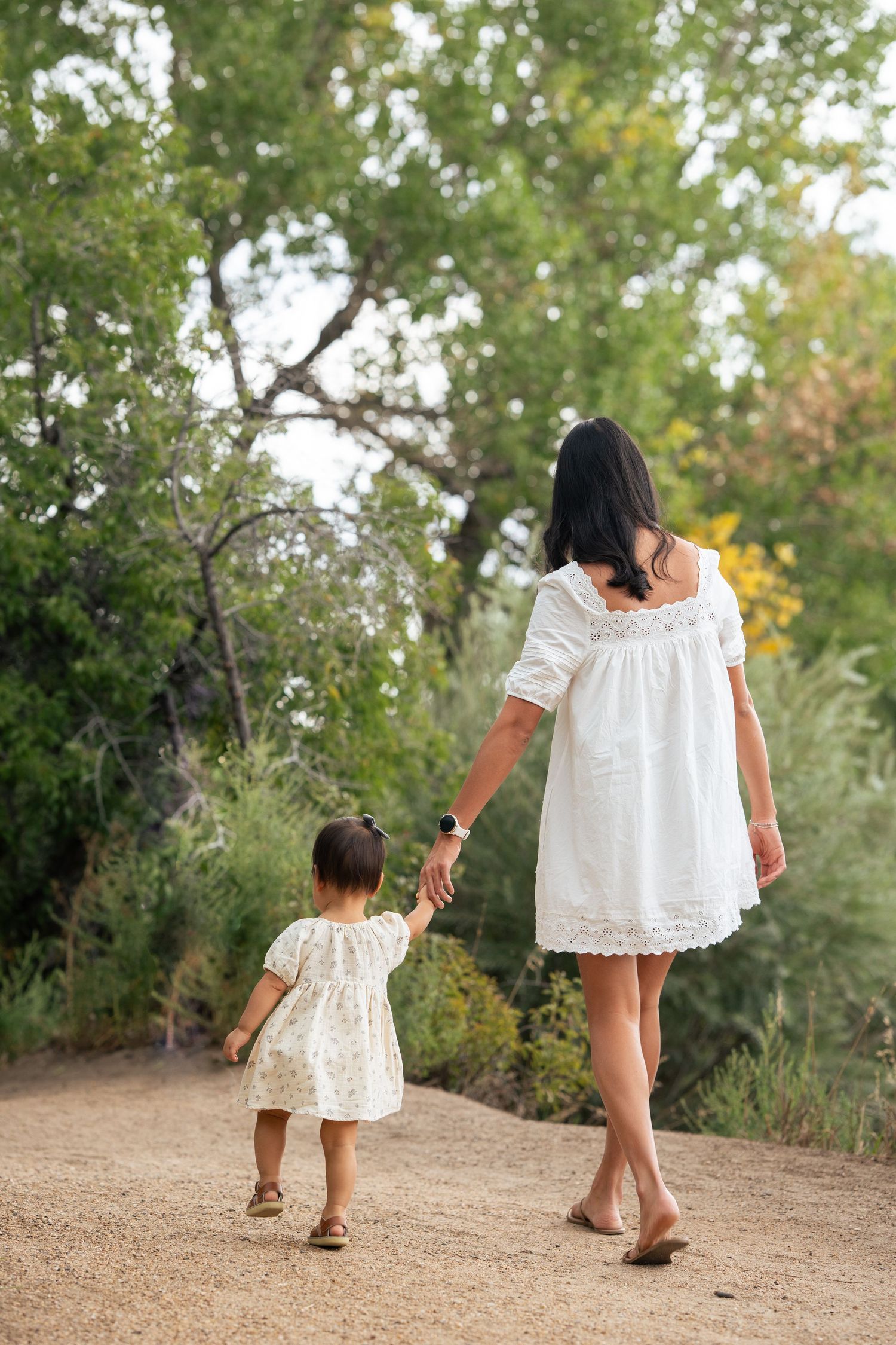 Baby and mama walking away.