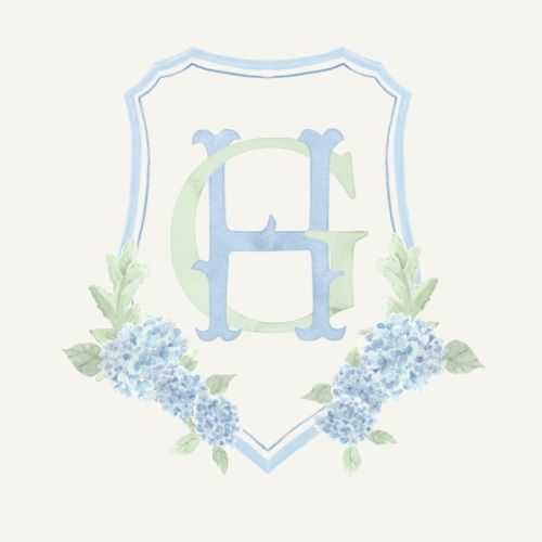 Watercolor wedding monogram crest featuring GH initials with blue hydrangea floral accents.