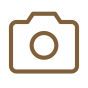 Brown outlined camera icon on white background.