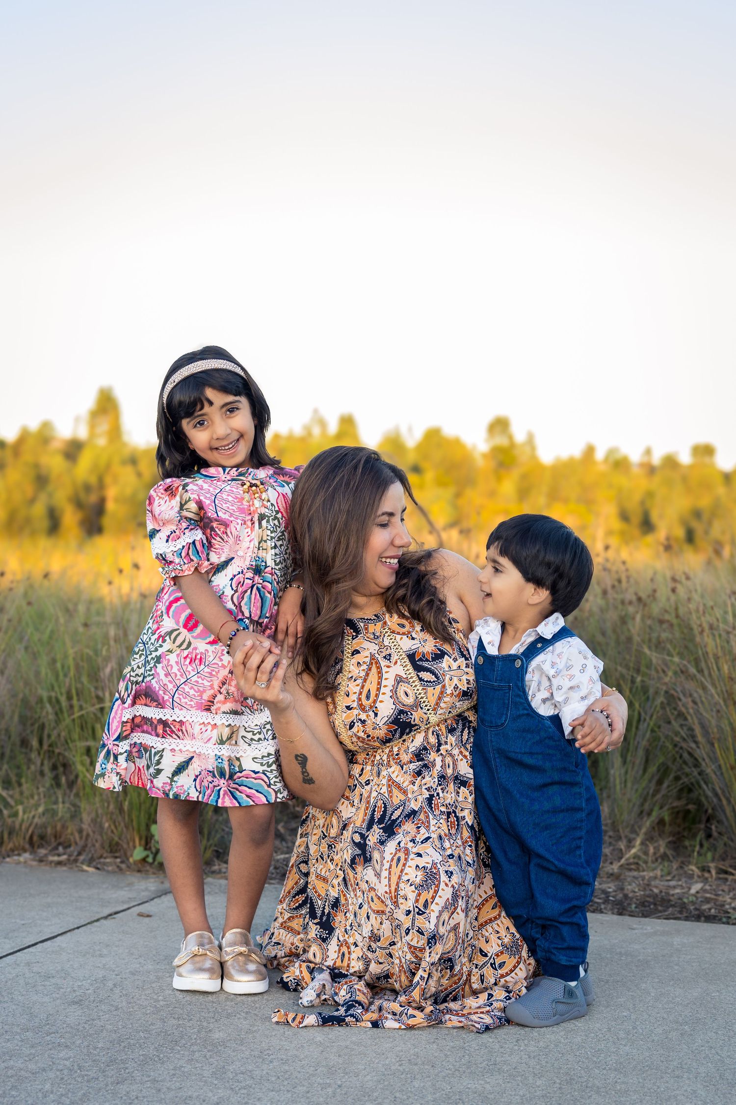 Happy family photography client smiling during outdoor Sydney photoshoot