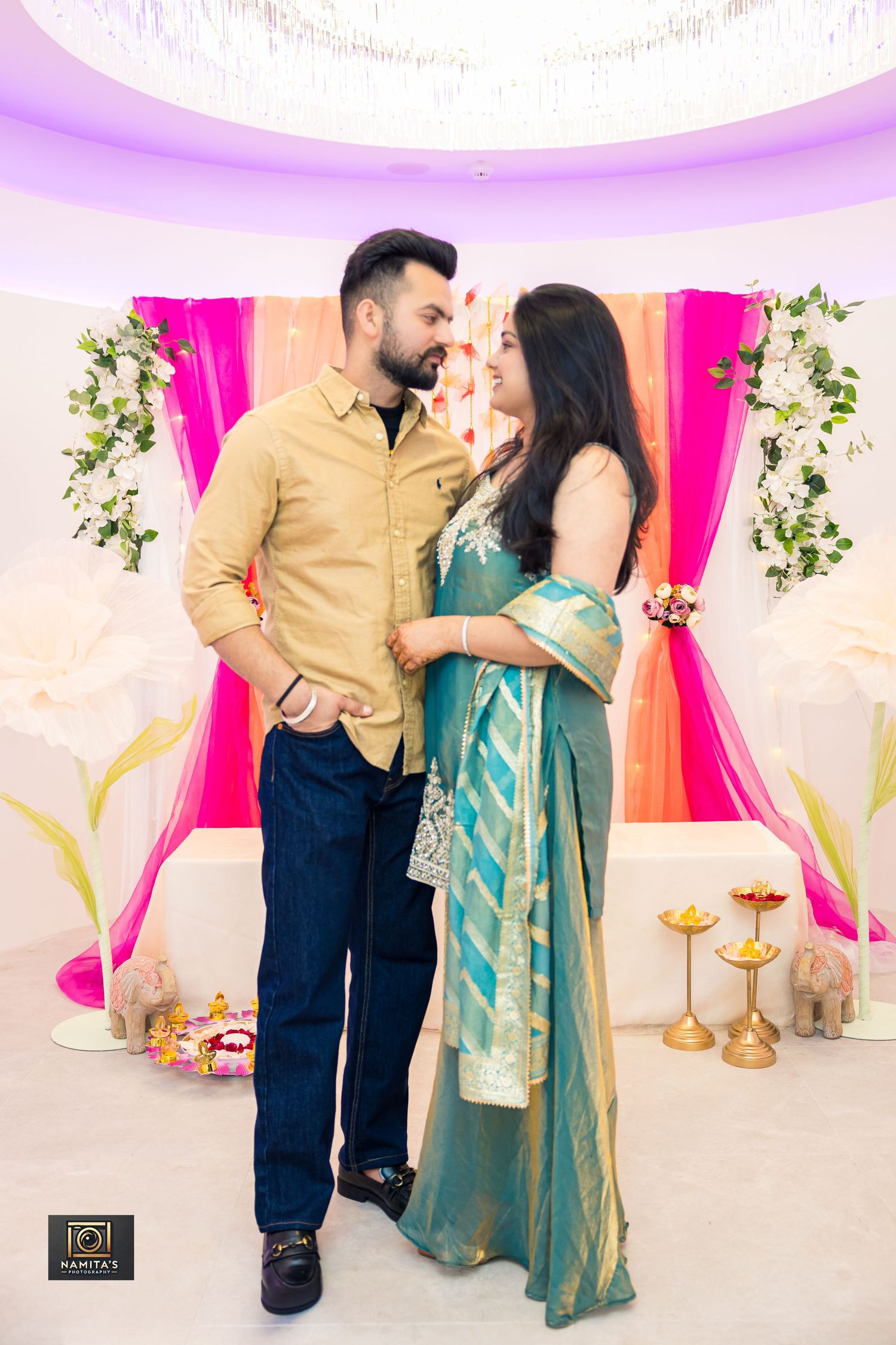 Couple photoshoot during a romantic pose by Namita's Photography