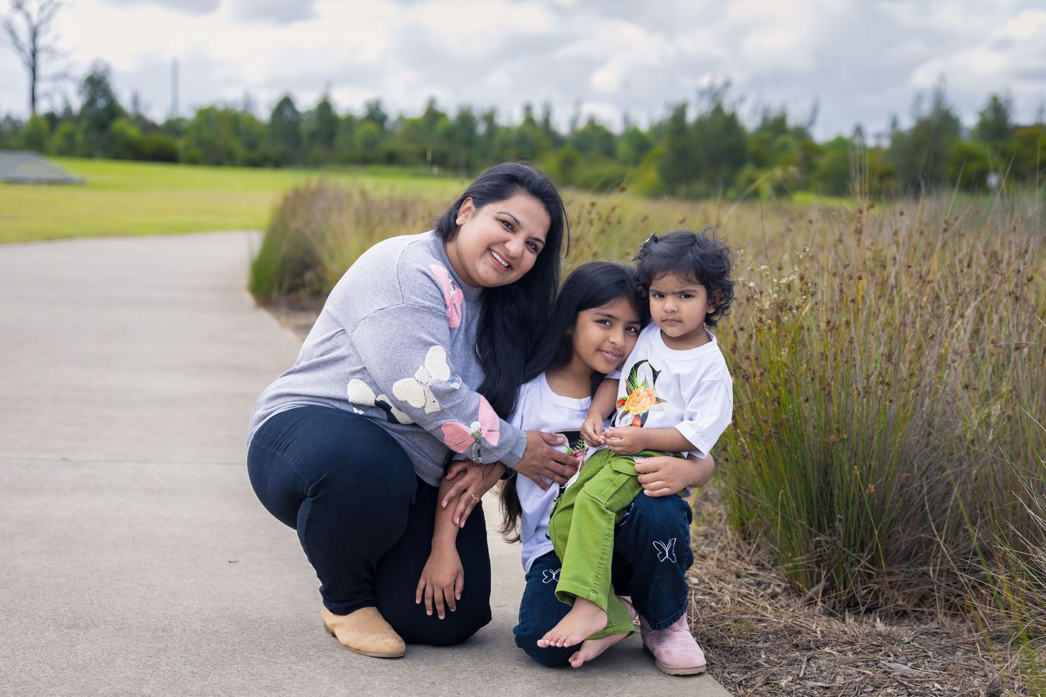 Mother and daughter candid moment captured during family photoshoot