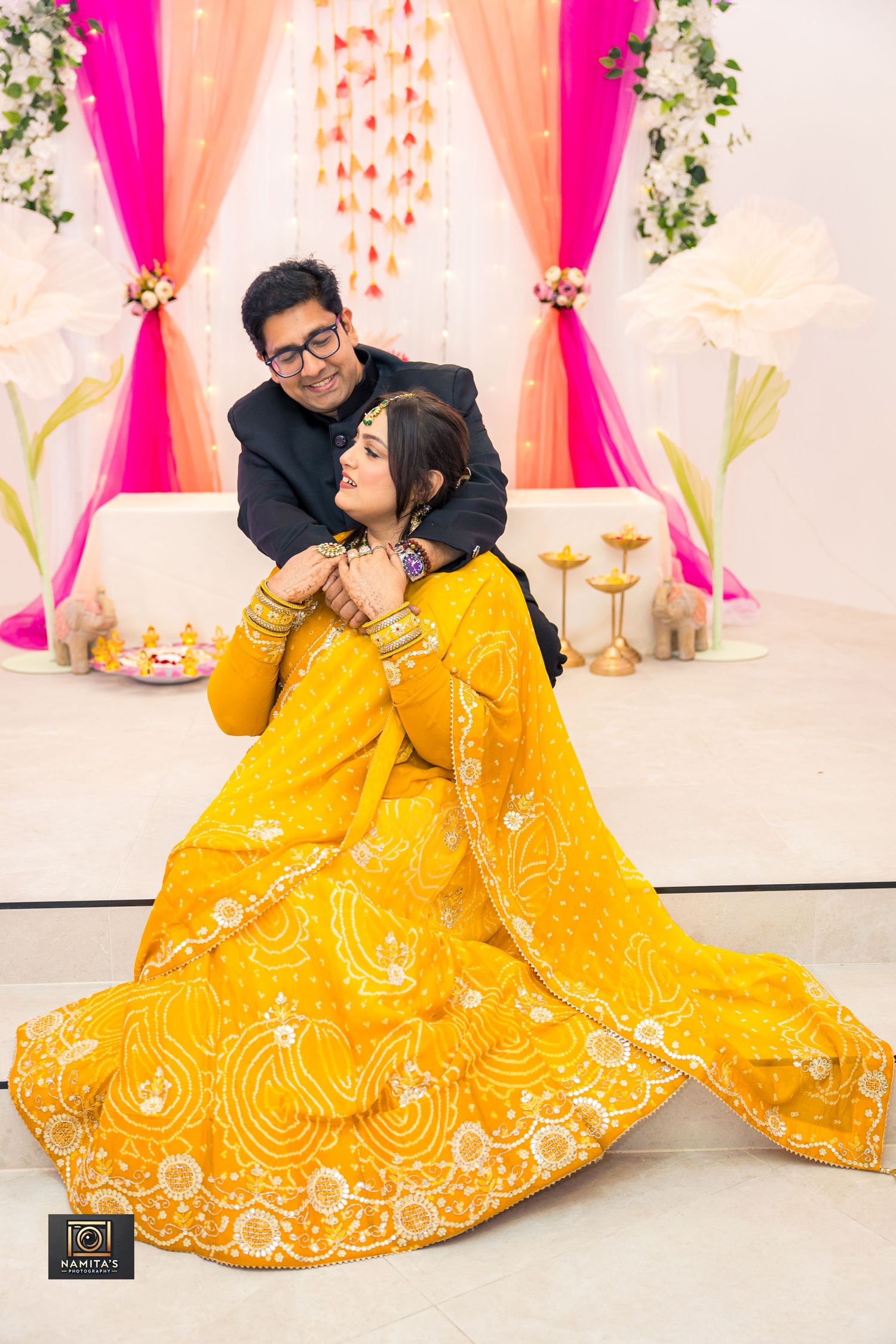 Couple photoshoot during a romantic pose by Namita's Photography
