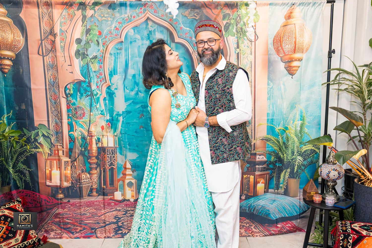 Couple embracing during golden hour portrait session by Namita’s Photography