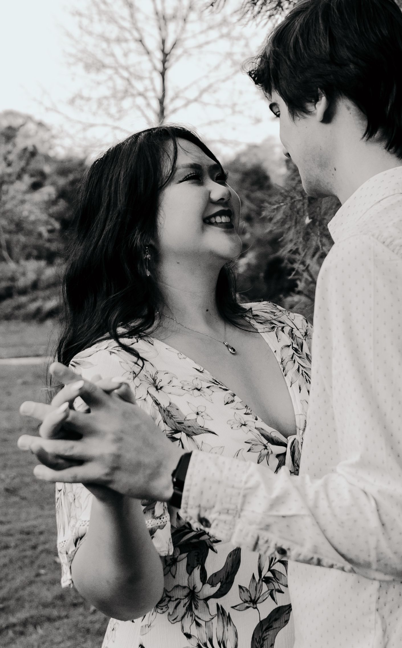 A joyful couple shares an intimate moment while dancing outdoors. Gippsland photographer. Melbourne photographer.