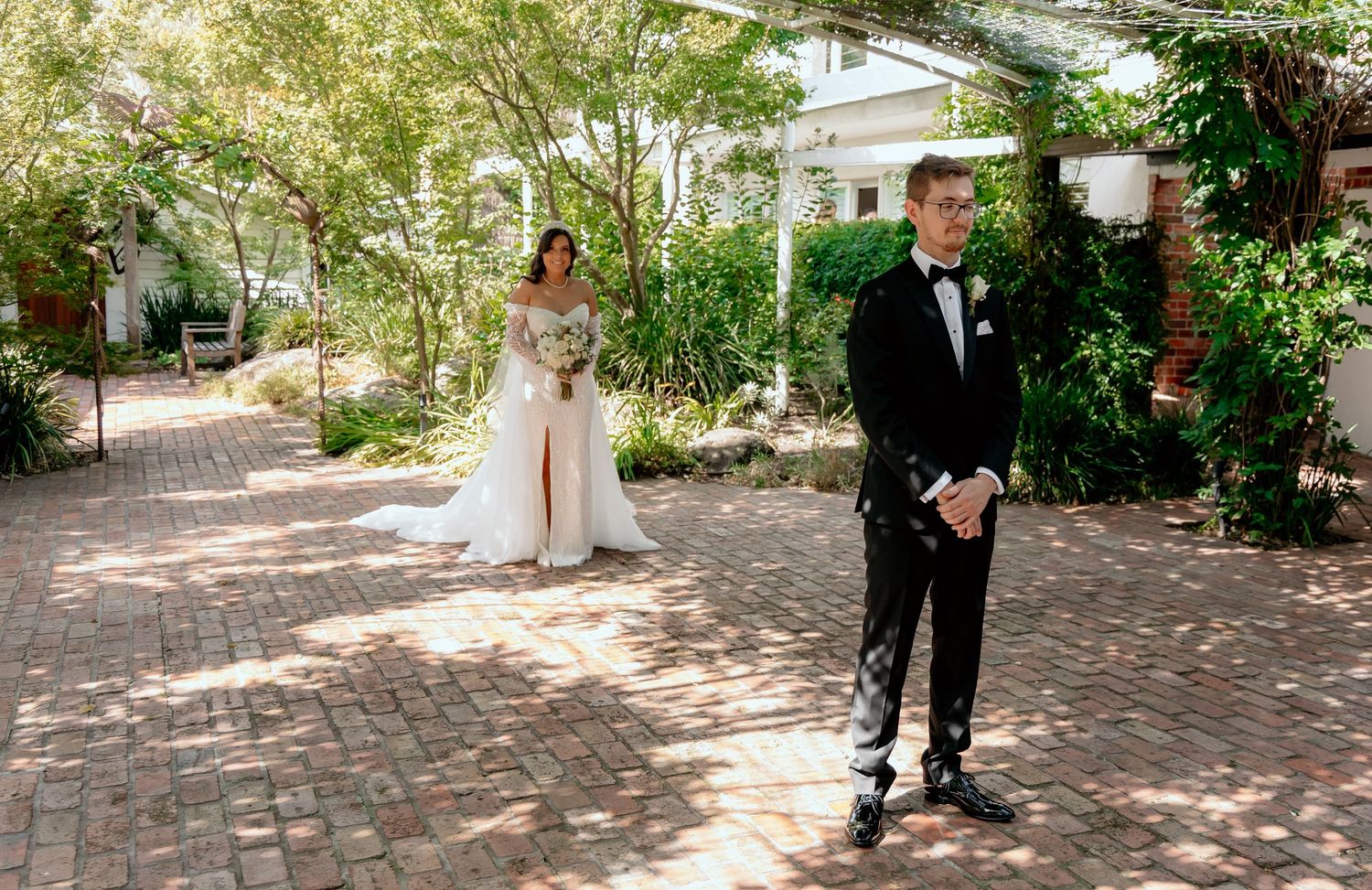 A sequence of wedding photos showing people walking down a brick pathway in an elegant garden setting.