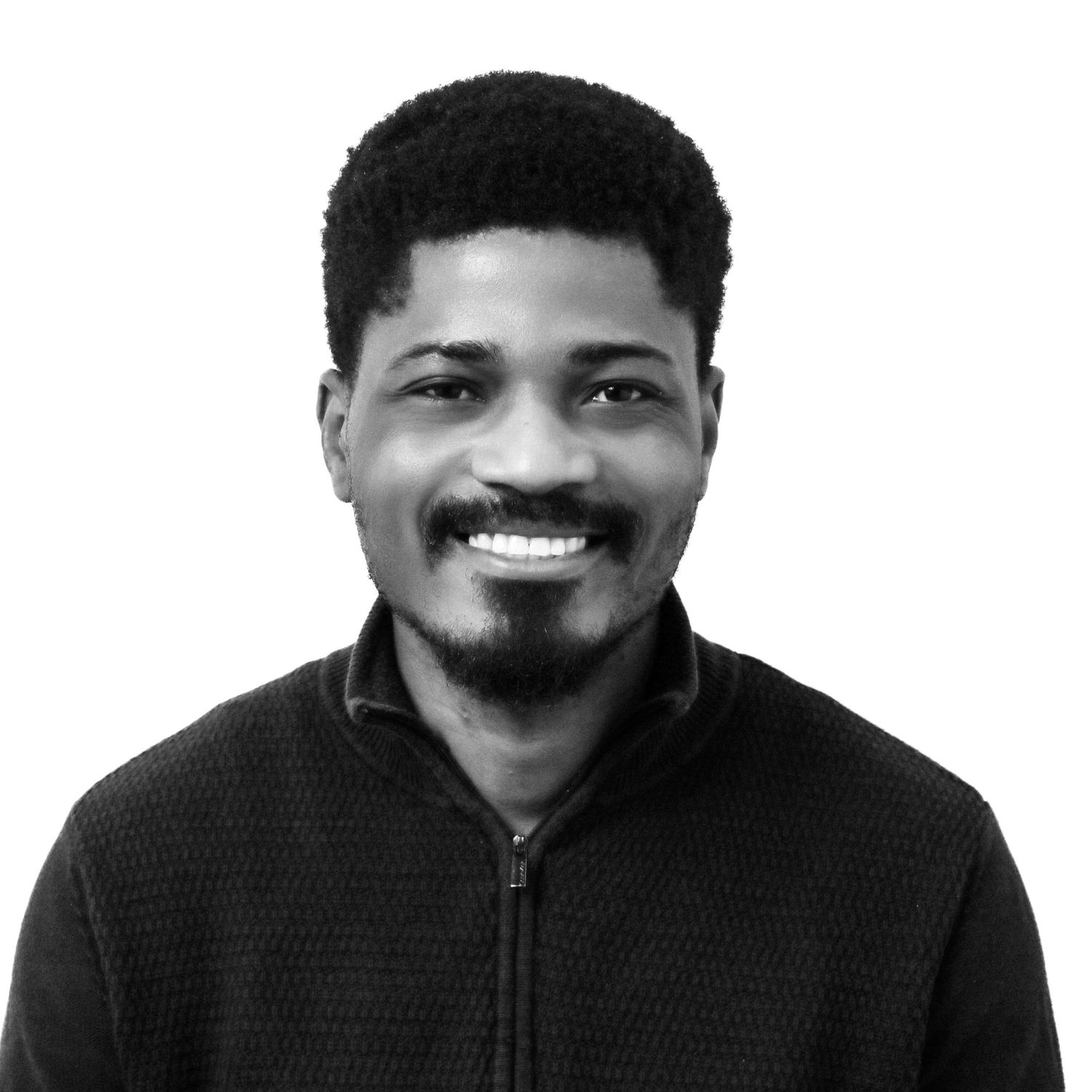Black and white portrait sequence showing the same person smiling progressively wider in each frame.