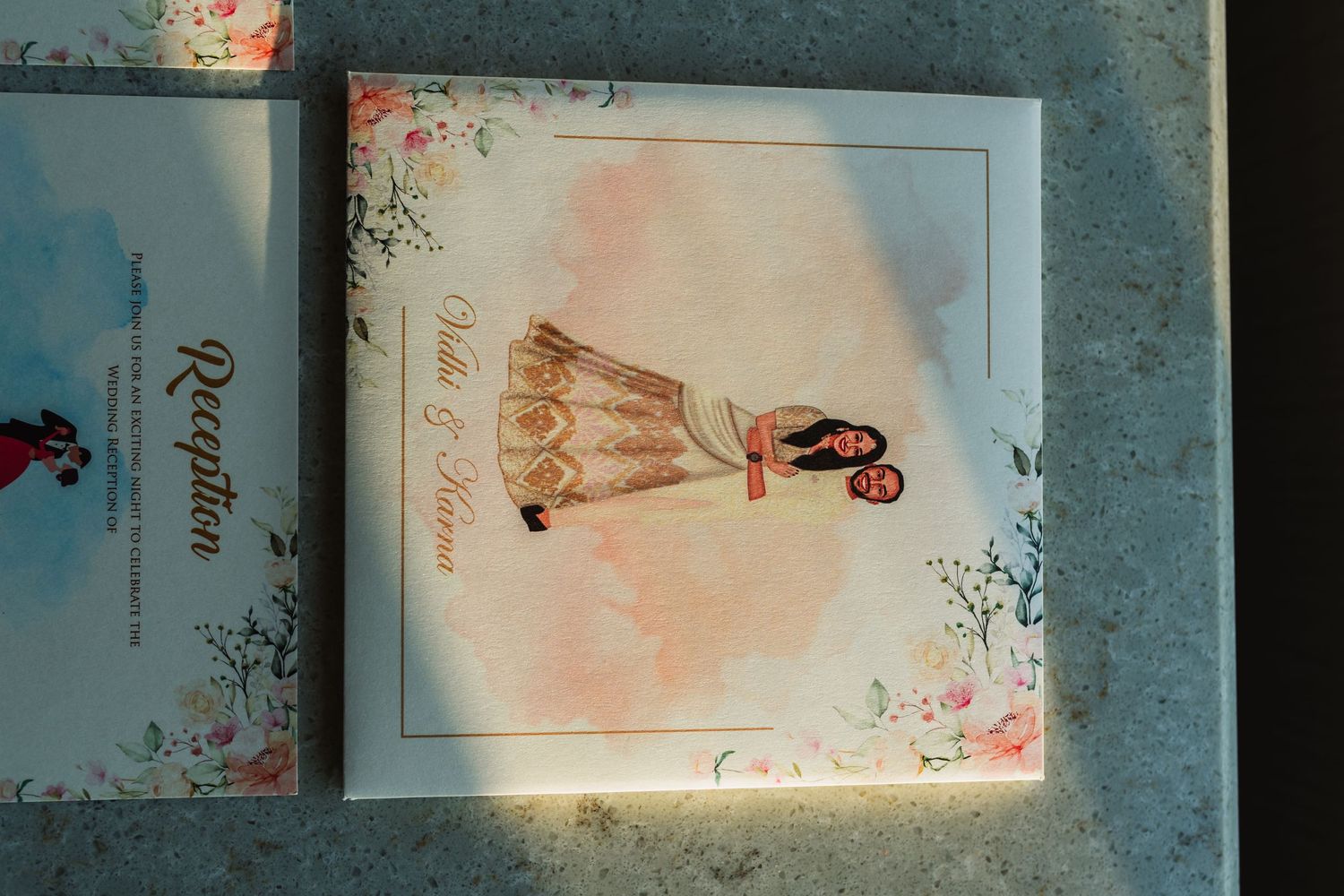 A vintage-style wedding invitation with a soft pink background featuring a delicate bridal dress illustration.