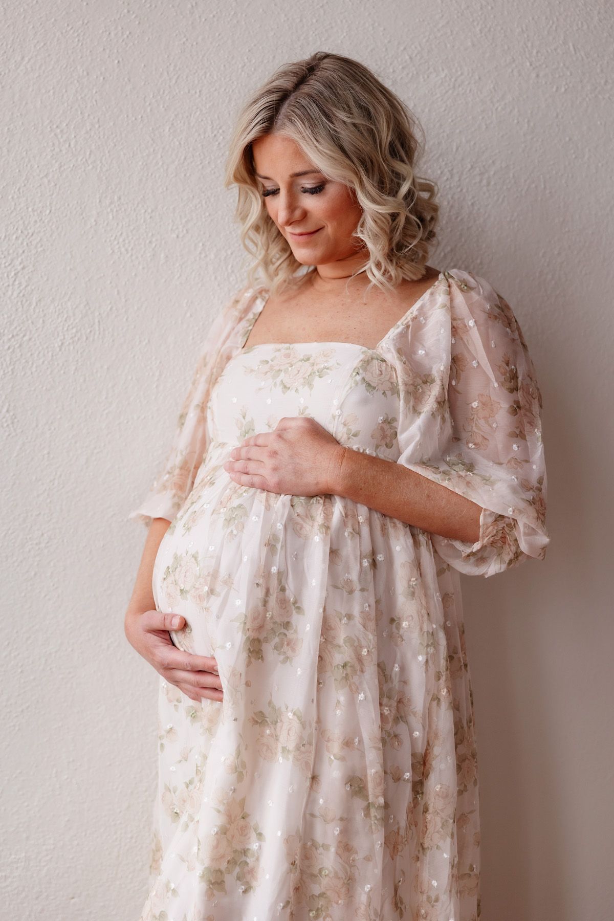 Studio maternity session in Ada, Oklahoma featuring professional styling, hair, and makeup