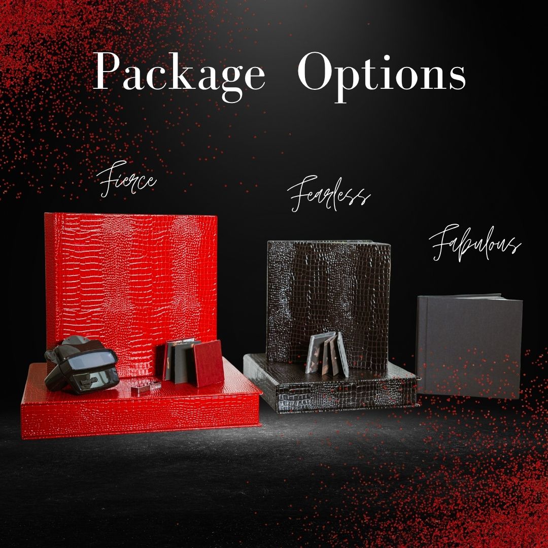 Stylish black and red retail display showcasing luxury boudoir product packages and product options against a dark background.