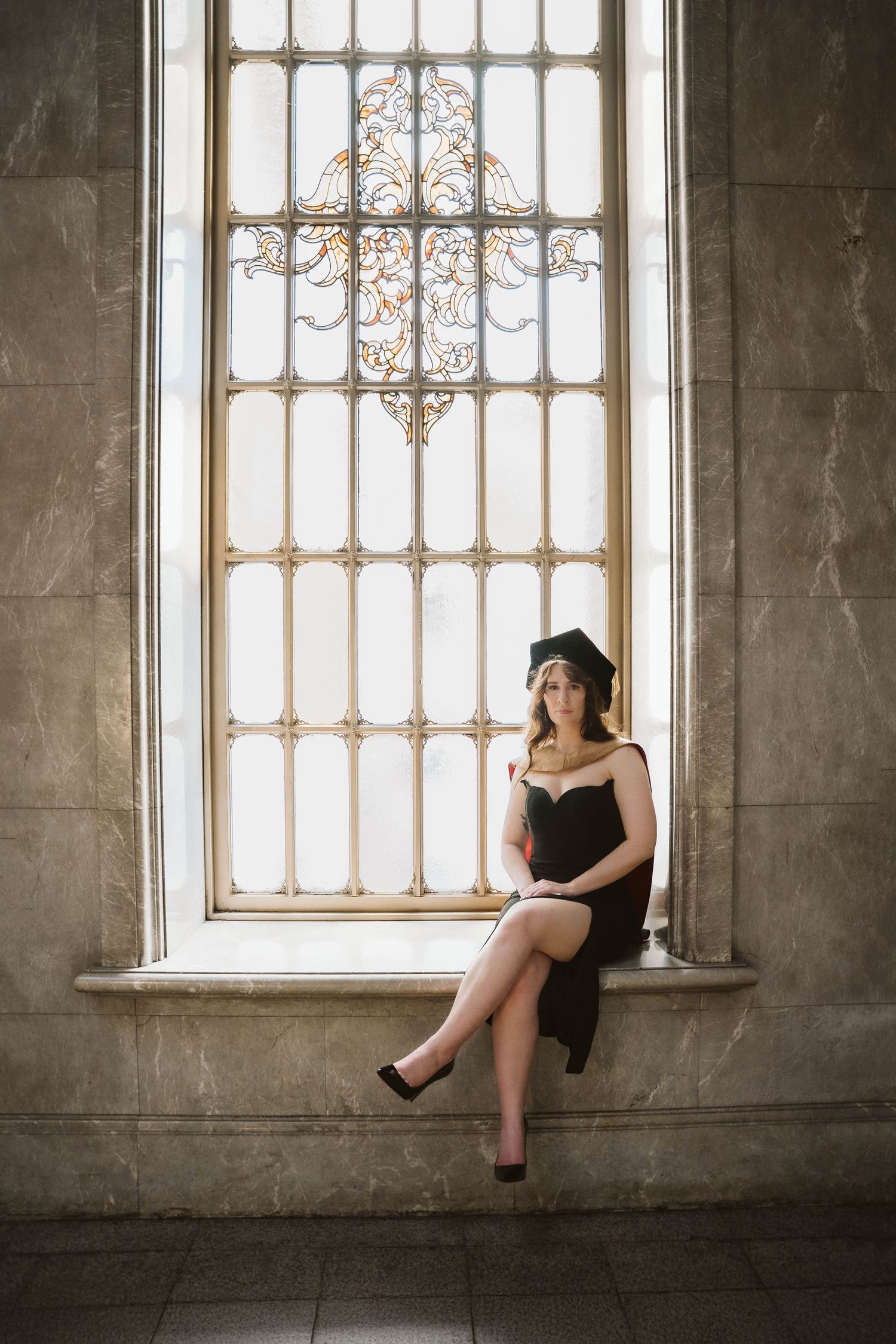 Artistic portrait series of a person sitting on a stone windowsill in a gothic architectural setting with ornate windows.