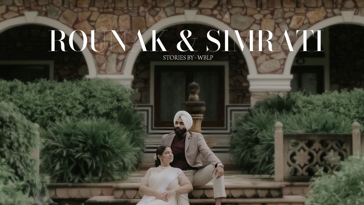 Elegant wedding portrait session set against vintage architecture and garden backdrop.