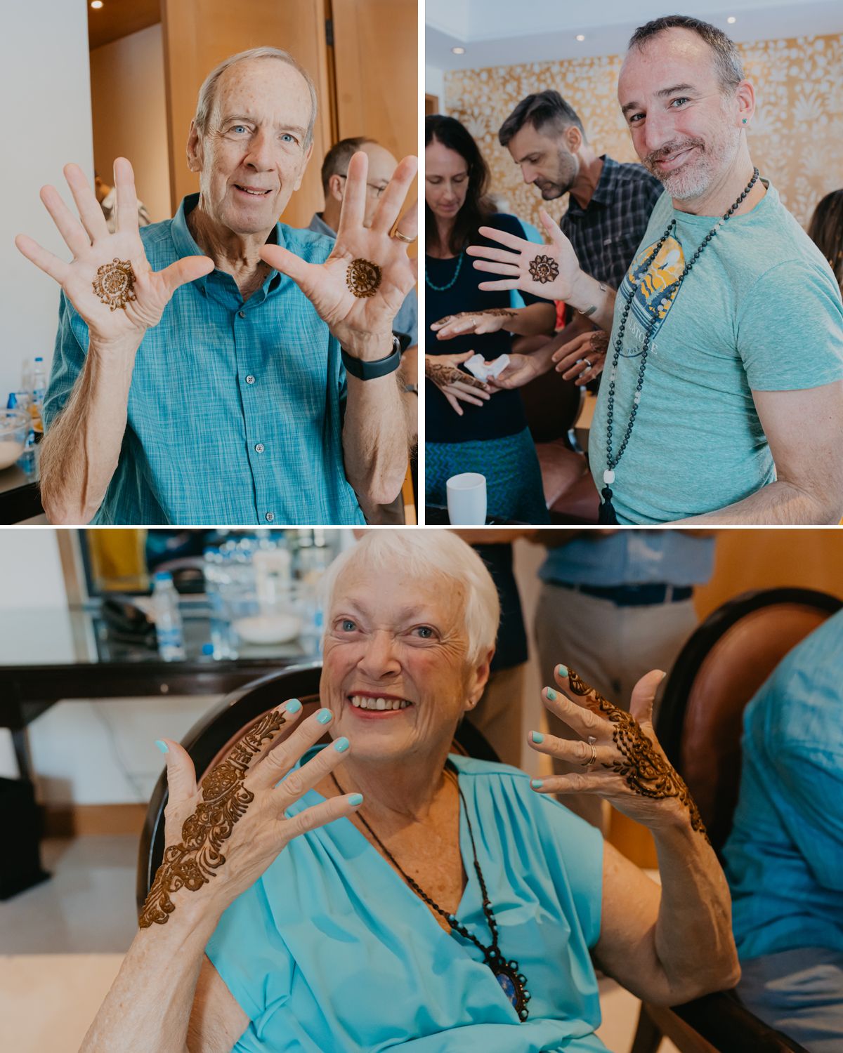 People showing their decorated hands with henna designs at a festive celebration.