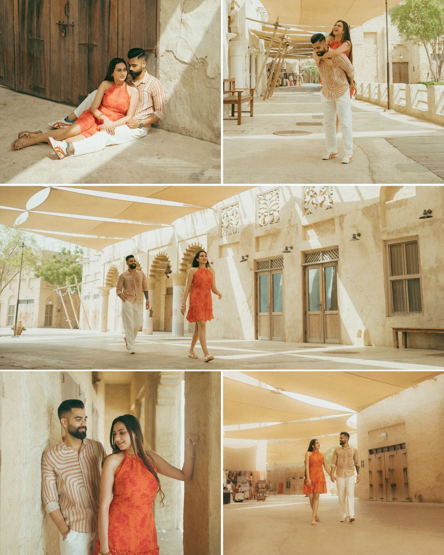 Couple in coordinating orange and beige outfits posing at a historic Middle Eastern architectural location.