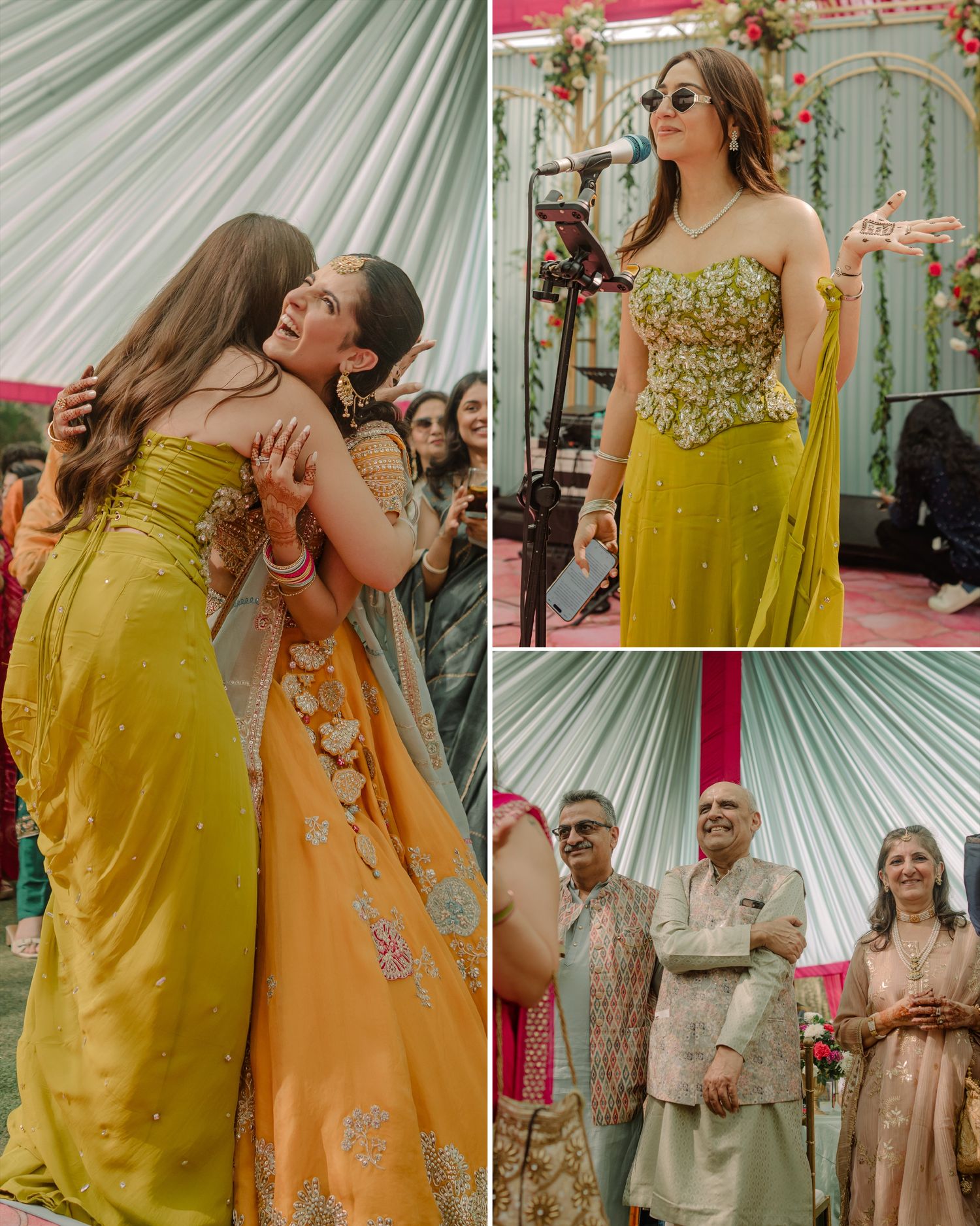 Women in yellow lehengas embrace at an Indian wedding celebration with guests in traditional attire.