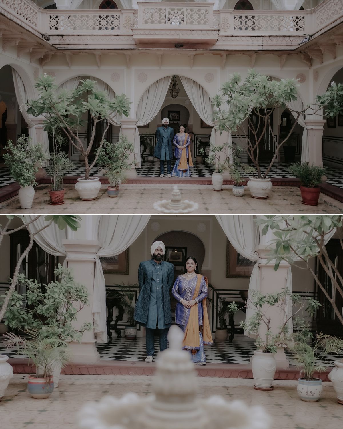 A couple in traditional Indian attire poses in a courtyard with white archways and lush greenery.