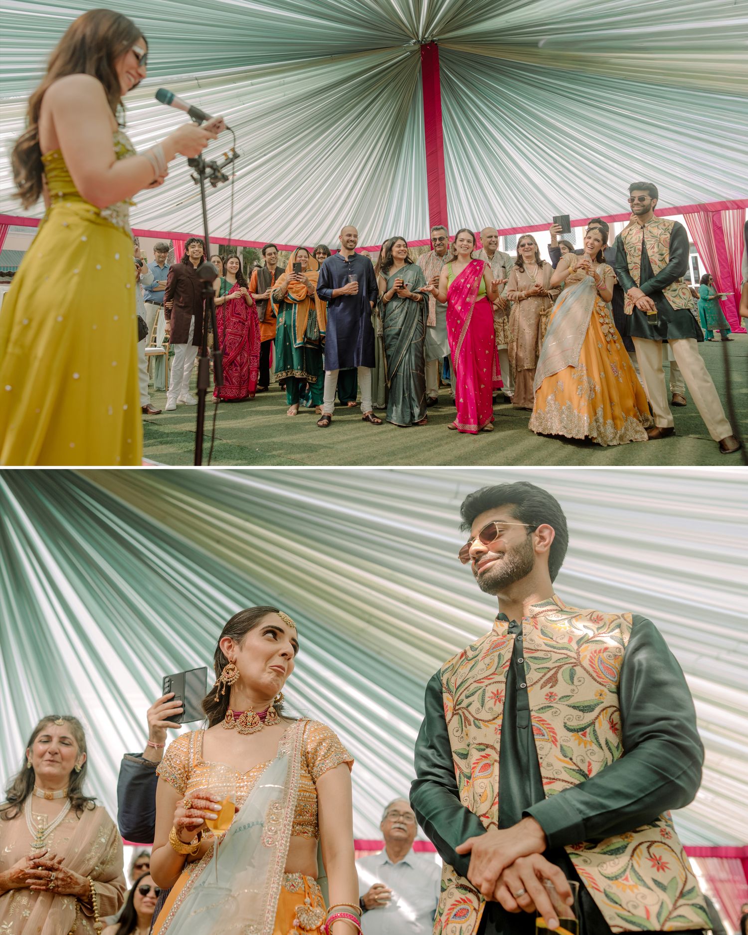 Indian wedding celebration with guests in colorful traditional attire, woman speaking at microphone, couple in elegant ethnic wear.