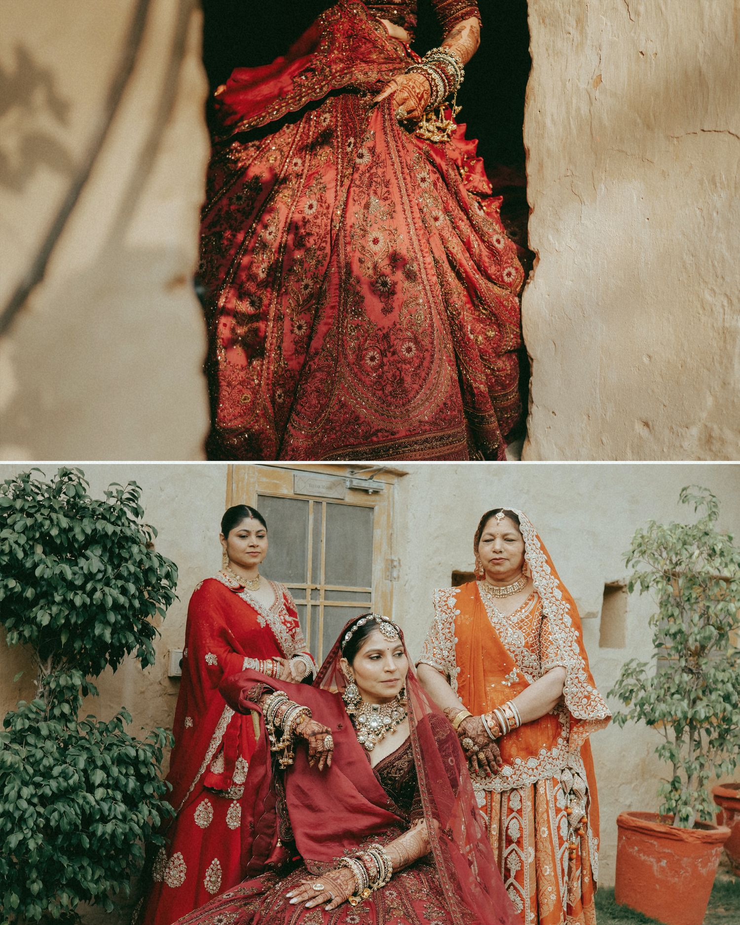 Indian bride in red embroidered lehenga with gold jewelry, posed with two women in traditional attire outdoors.