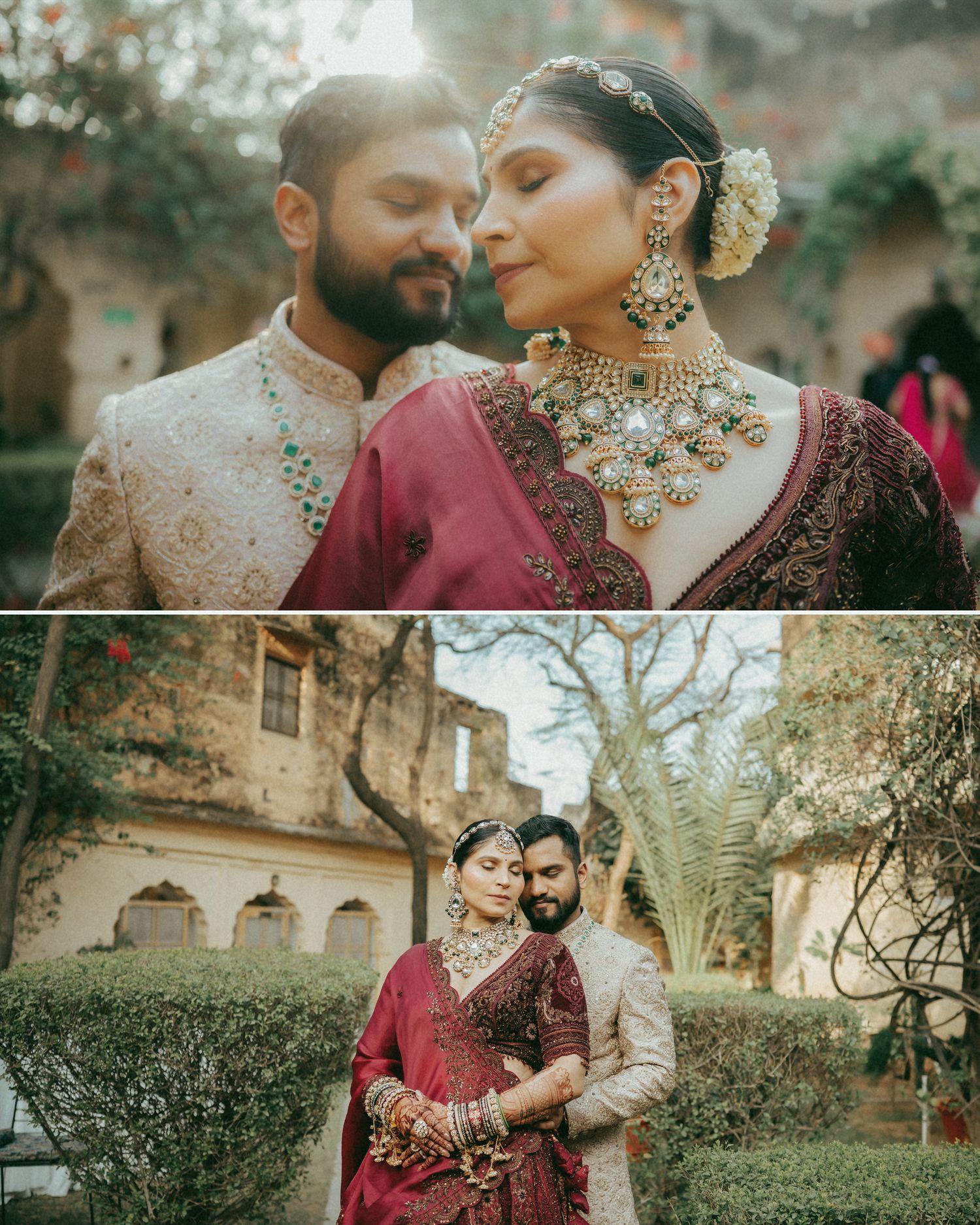 Indian bride and groom in traditional wedding attire pose romantically at a historic venue surrounded by lush greenery.