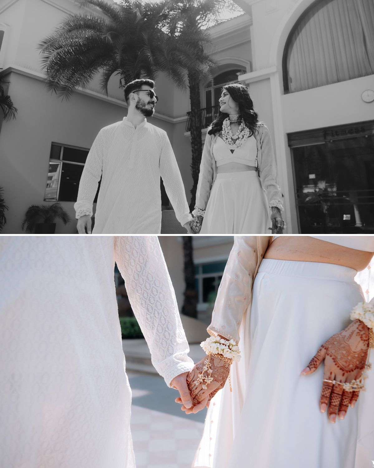 Couple in white traditional attire holding hands with detailed henna visible.