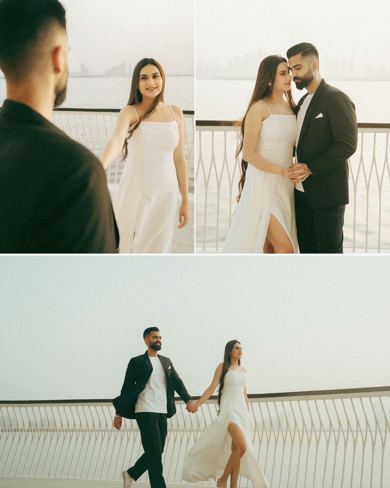 Couple in white dress and black suit posing on a waterfront balcony, holding hands in a romantic pre-wedding photoshoot.