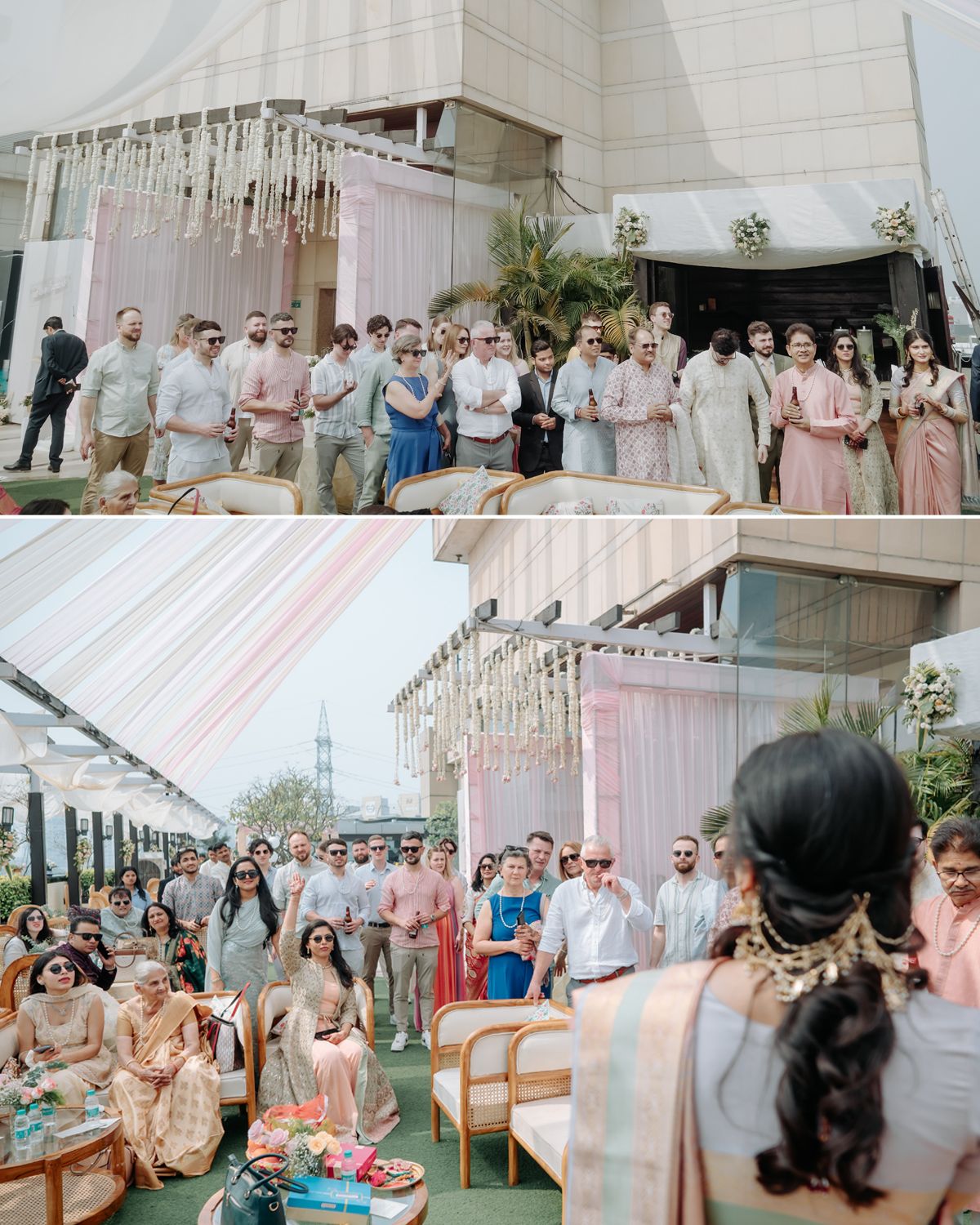 Large group photo of wedding party in pastel attire gathered under white canopy at outdoor venue.