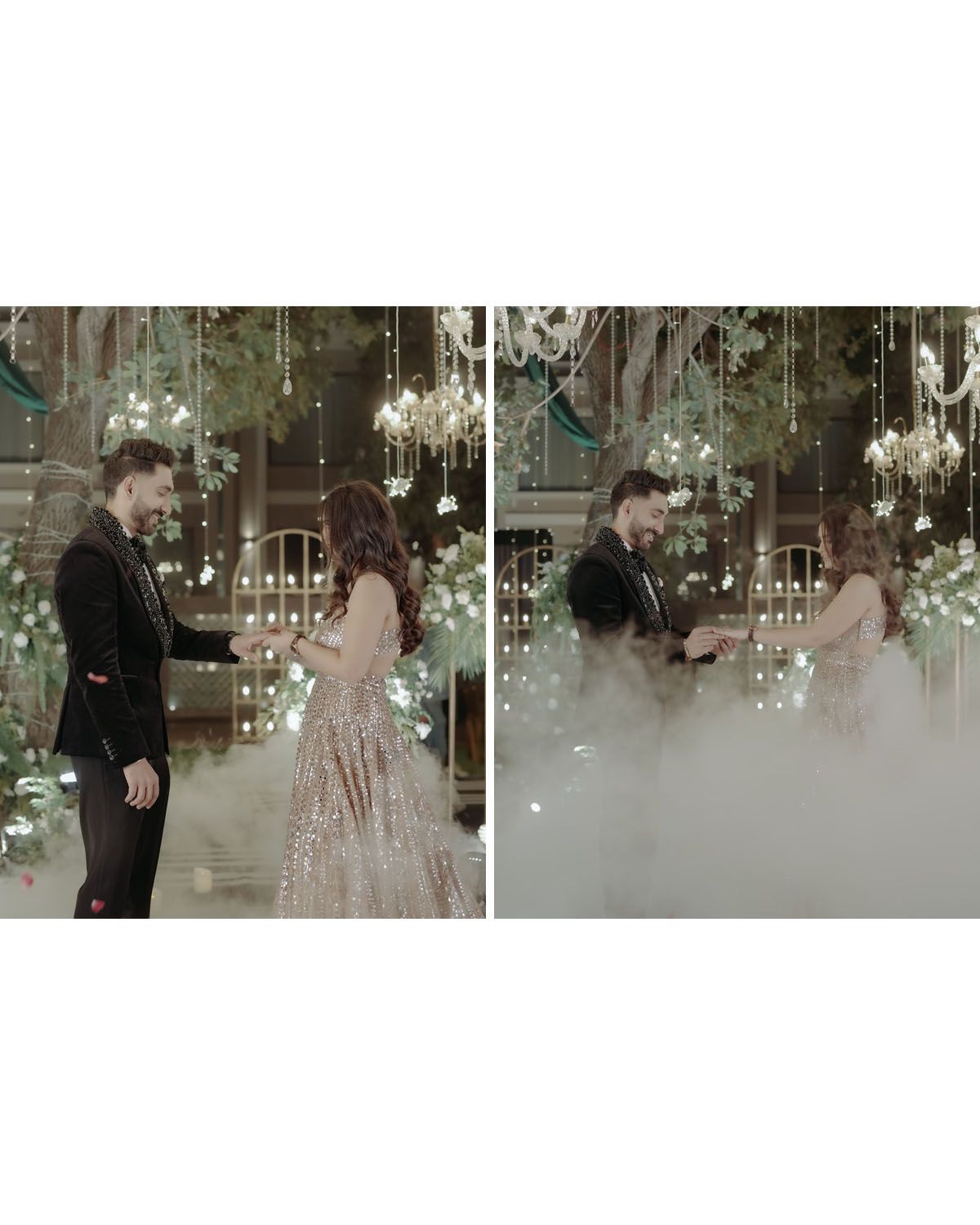 Elegant couple in formal attire share a romantic moment under crystal chandeliers and floral decorations in a dreamy setting.