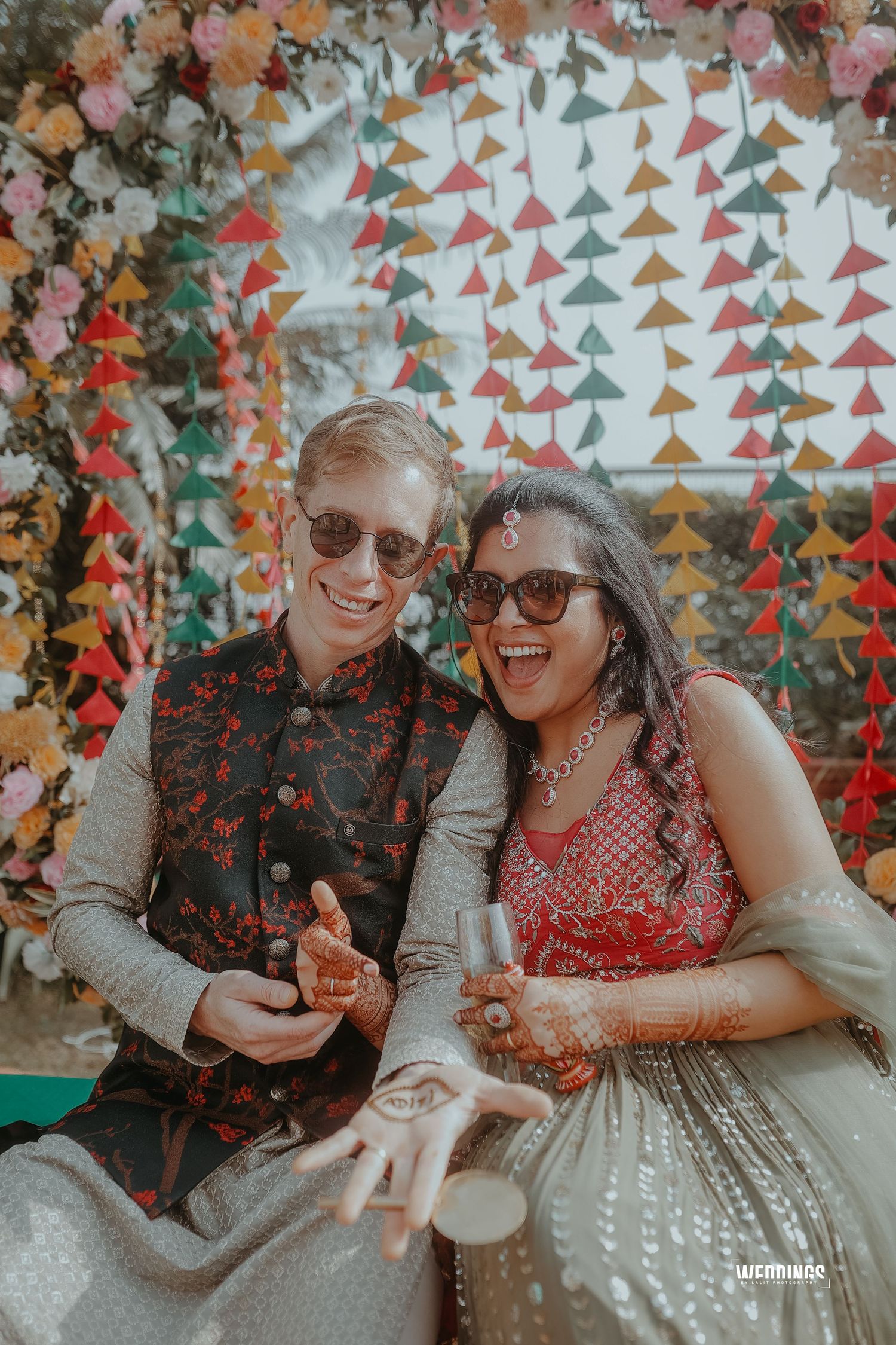 Celebration scene with colorful triangle bunting backdrop and festive decor.