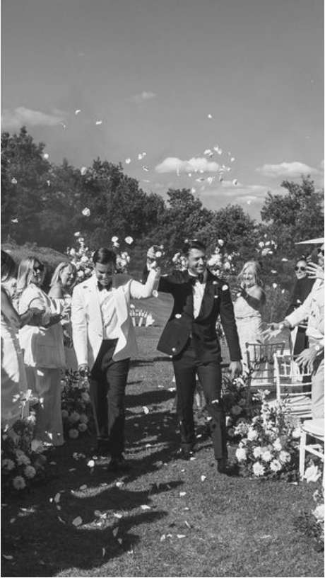 Same-sex couple exchanging vows at a romantic Amalfi Coast wedding.