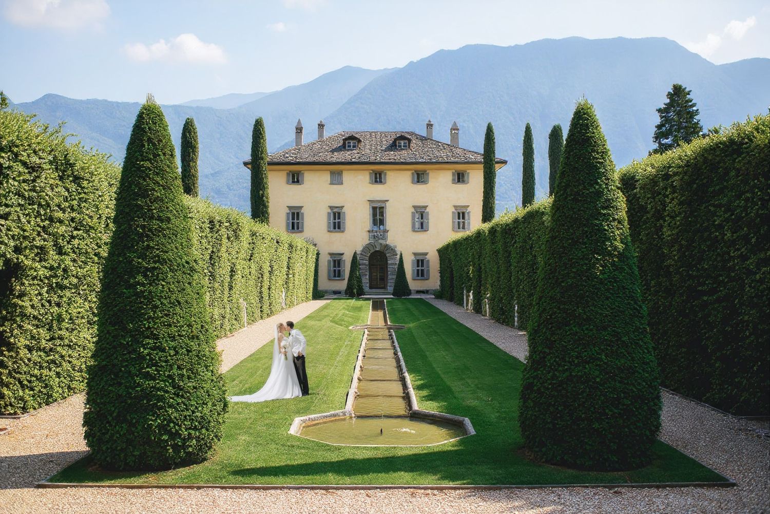 Bride and groom at their destination wedding in Lake Como with a timeless cinematic style.