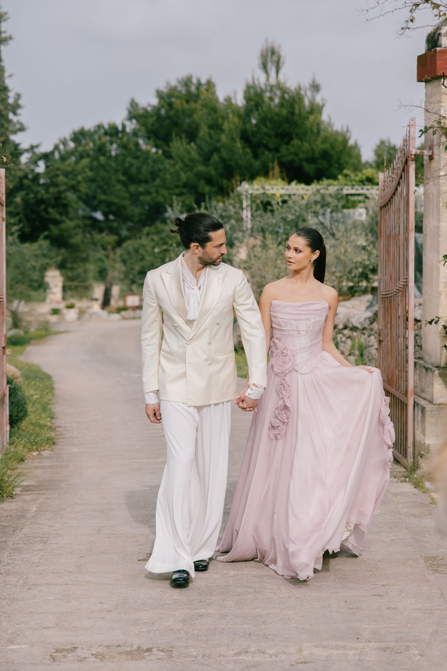 Groom getting ready in a luxury Italian villa for a destination wedding.