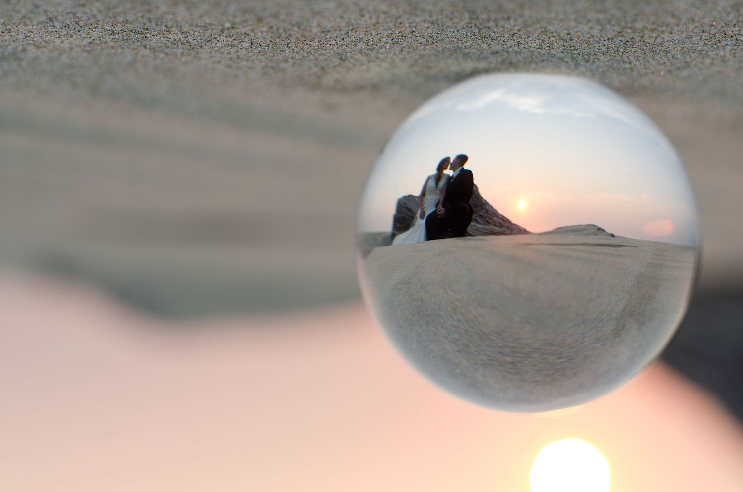 Series of minimalist sunset photographs through circular frames. Whitney McLaren Photography