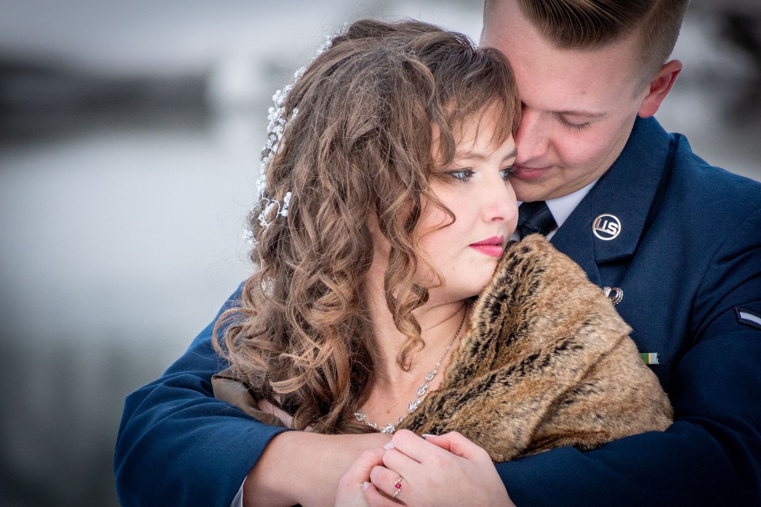 Intimate couple portrait with soft lighting and romantic embrace. Whitney McLaren Photography