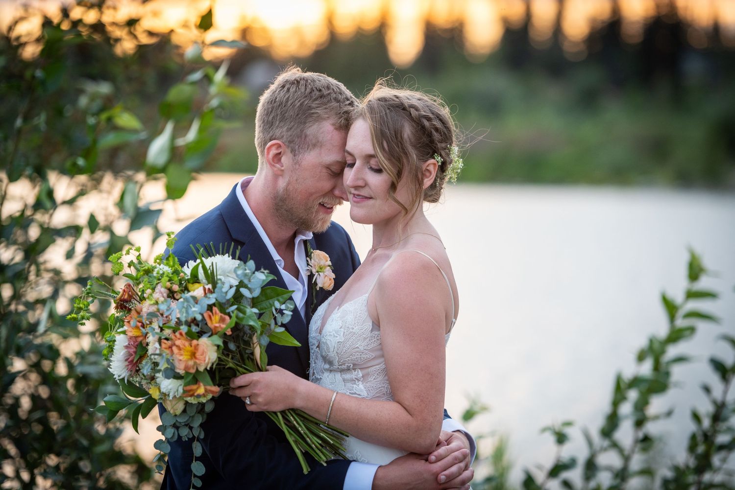 Romantic sunset wedding photos in a natural outdoor setting. Whitney McLaren Photography