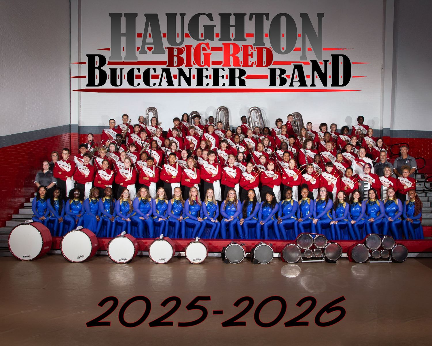 Haughton Big Red Buccaneer Band 2025-2026 group photo featuring students in red and blue uniforms with drums.