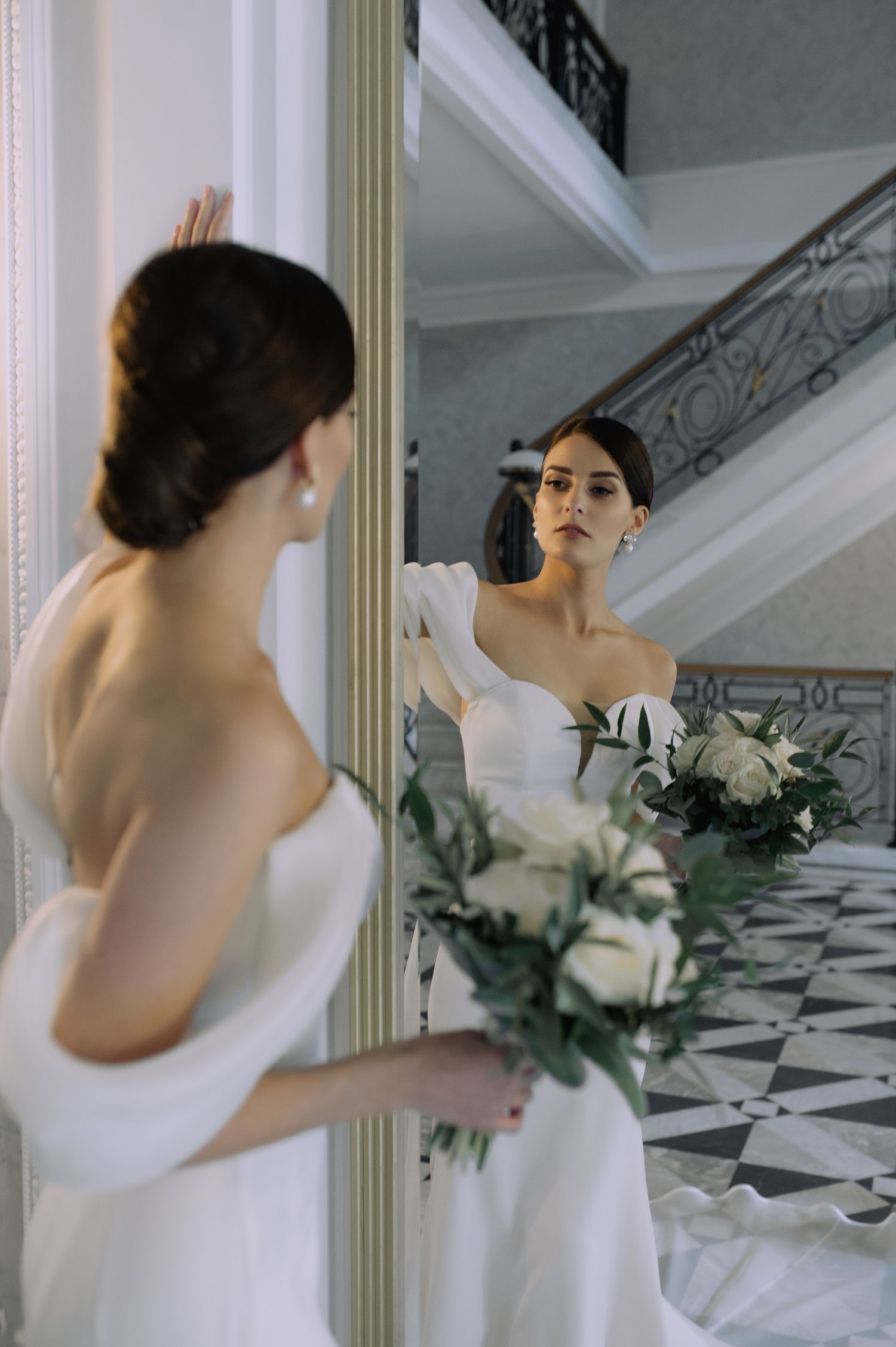 A series of ethereal bridal portraits in white against a light interior with architectural columns and greenery accents.